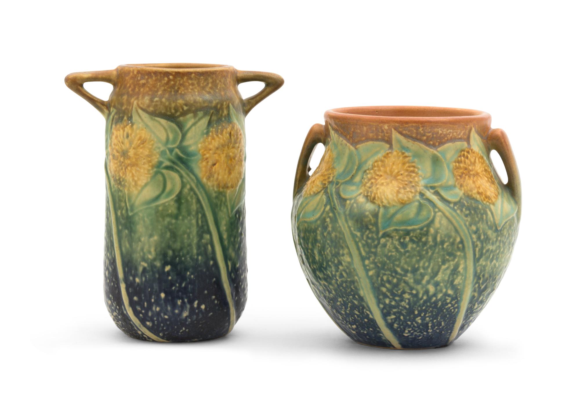 Two Roseville Sunflower Pottery Vases Height of taller 6 1/8 inches.