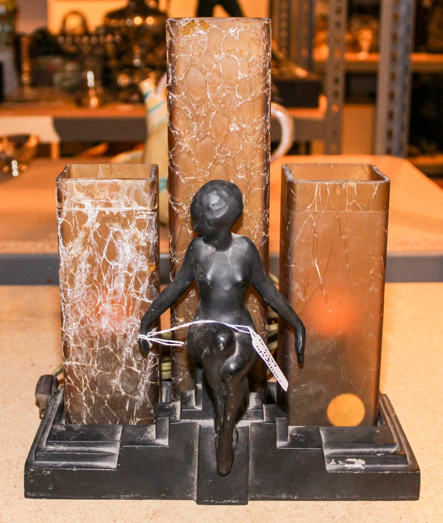 An Art Deco Cast Metal Figural Lamp Height with base 10 1/2 inches.