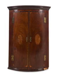 A George III Mahogany Corner Cabinet