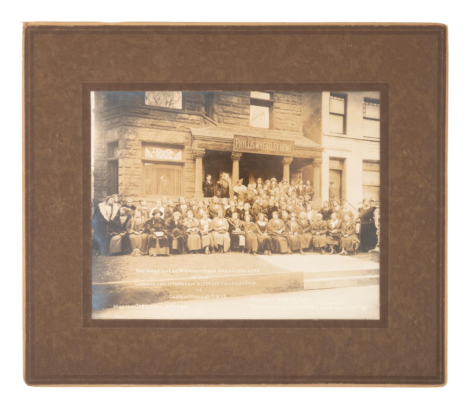 [EARLY PHOTOGRAPHY]. Portrait of African American women's org. outside of the Phyllis Wheatley Home.