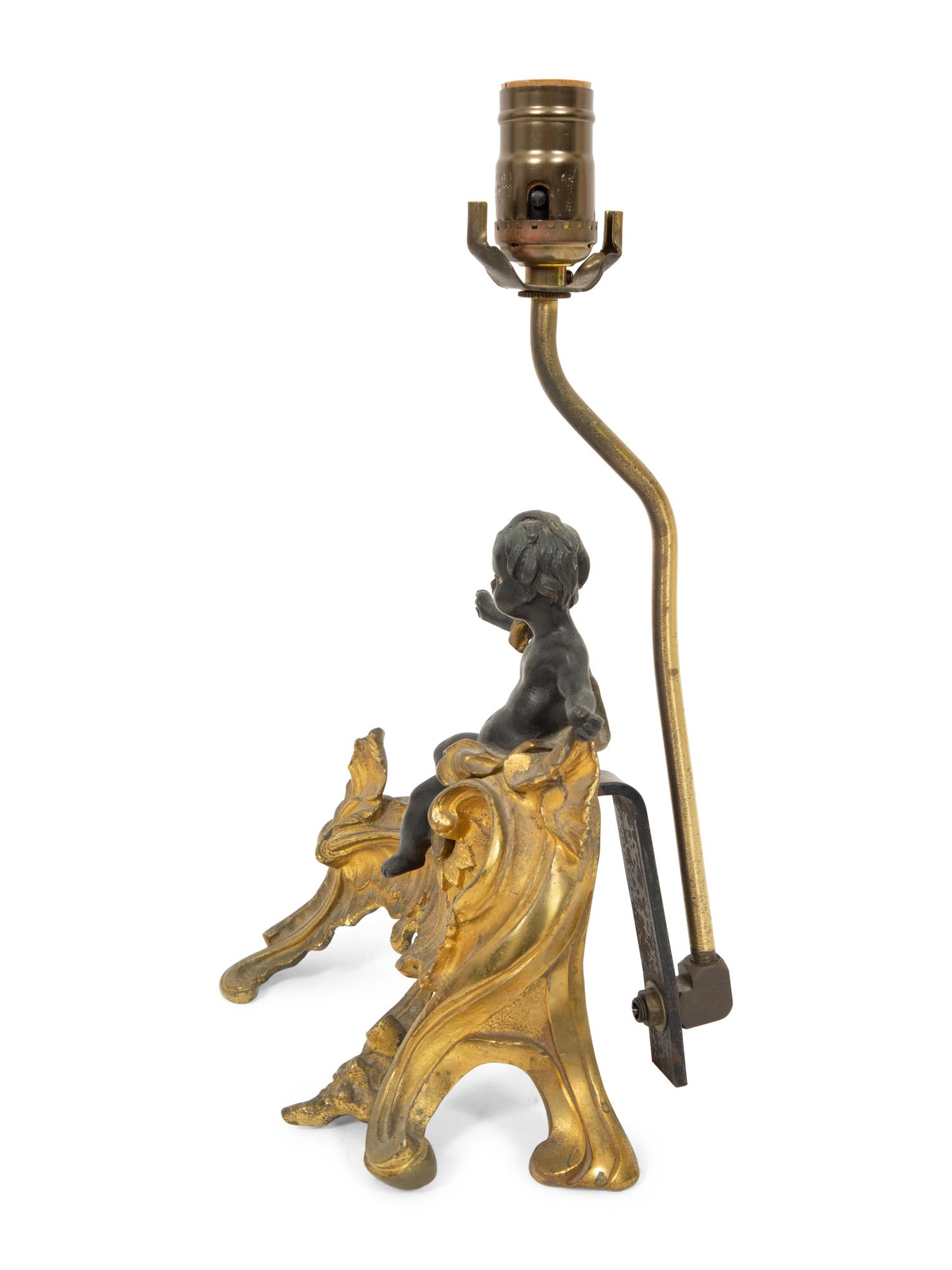 A Louis XV Style Gilt and Patinated Bronze Chenet Mounted as a Lamp