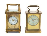 Two Brass Carriage Clocks, Height of taller over handle 6 inches.