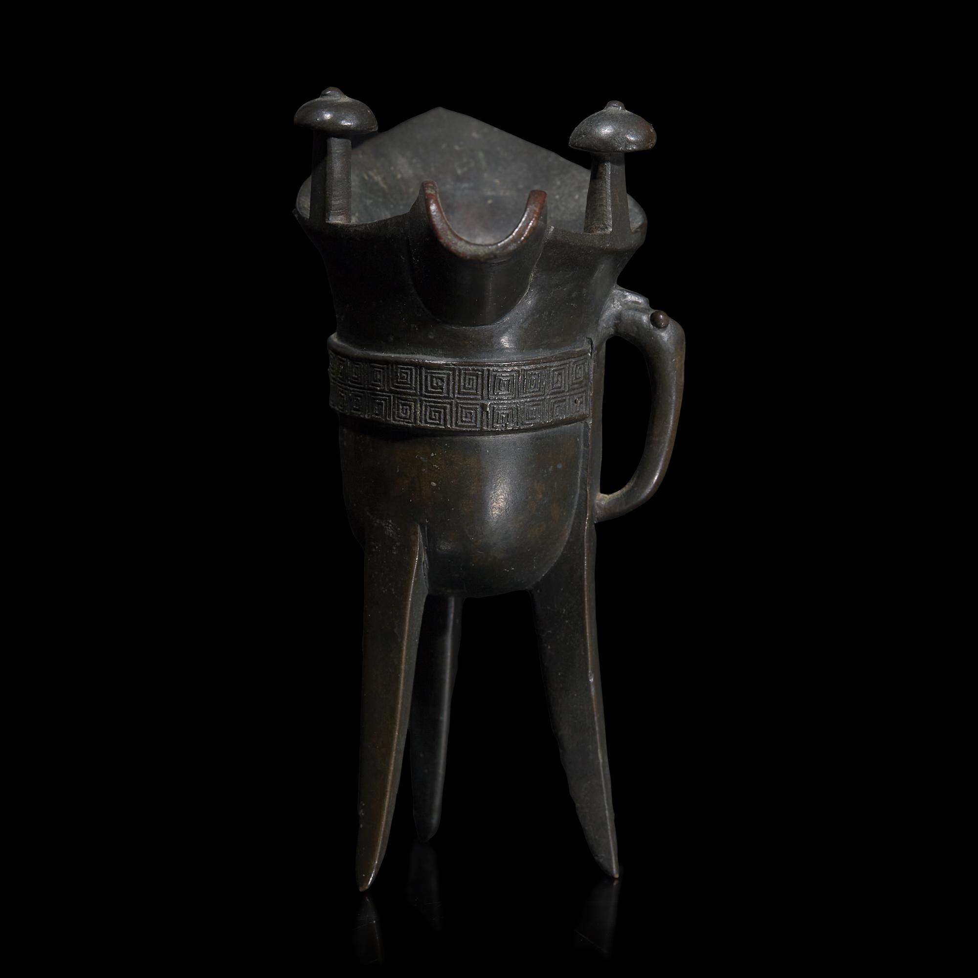 A Chinese Archaistic Patinated Bronze Jue Wine Cup, Late Ming to Qing Dynasty 明末清初 銅加漆爵杯