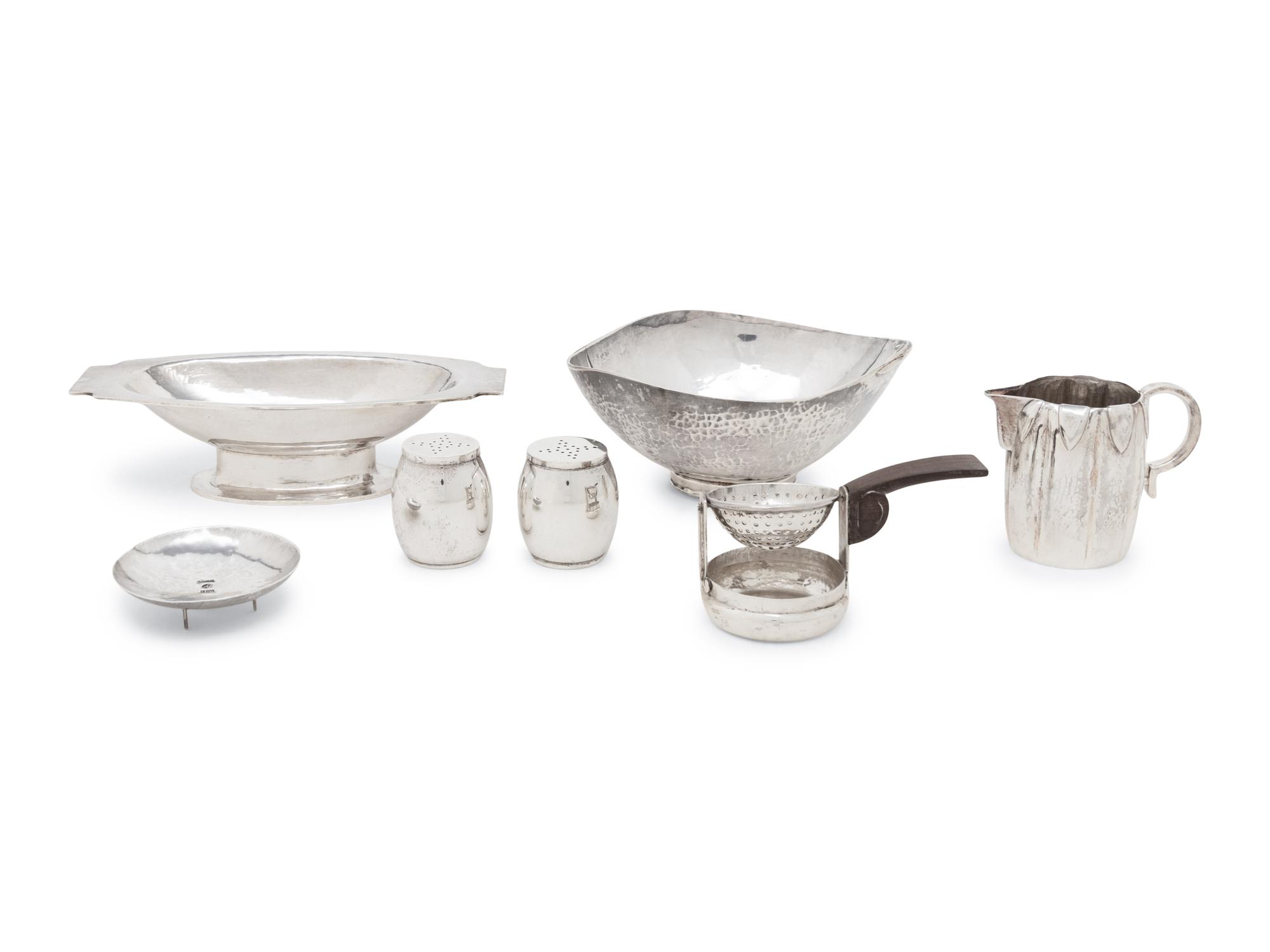 A Group of Arts and Crafts Silver Table Articles