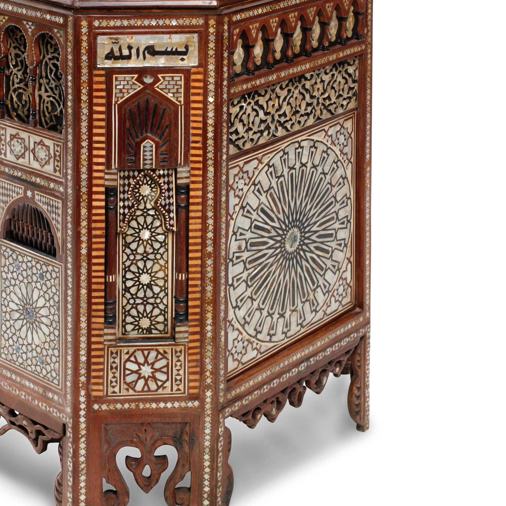 A Moorish Style Marquetry and Mother-of-Pearl Inlaid Lift Top Chest