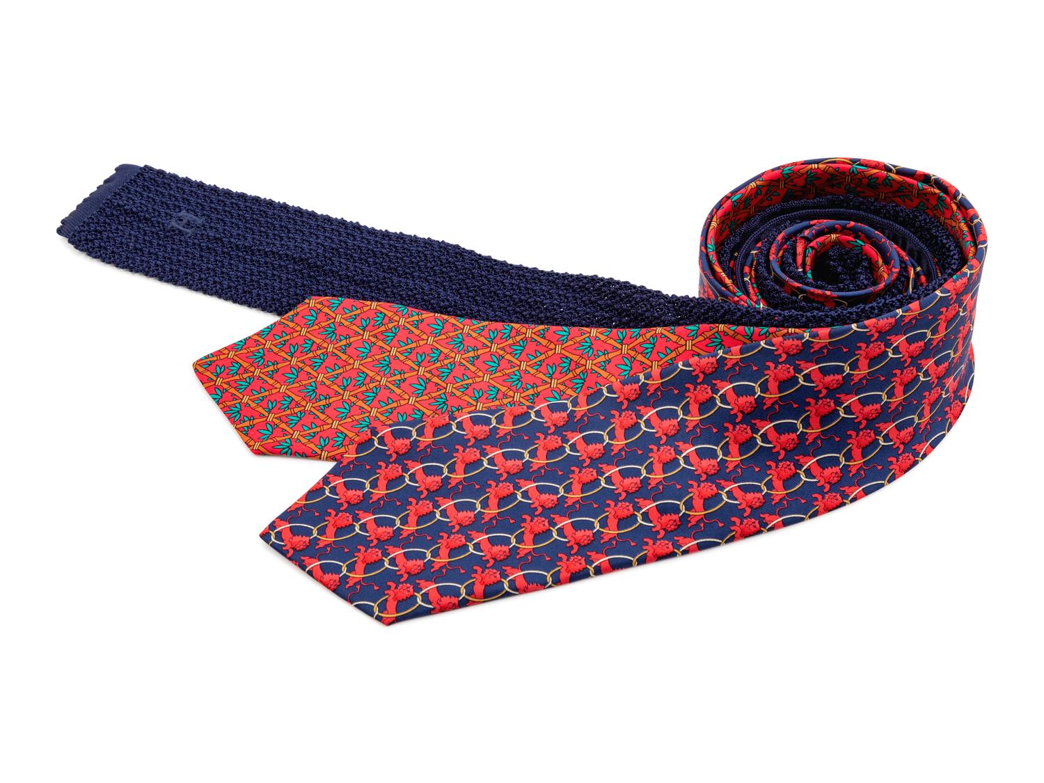 Three Hermes ties, one red, one blue, one blue knit tie