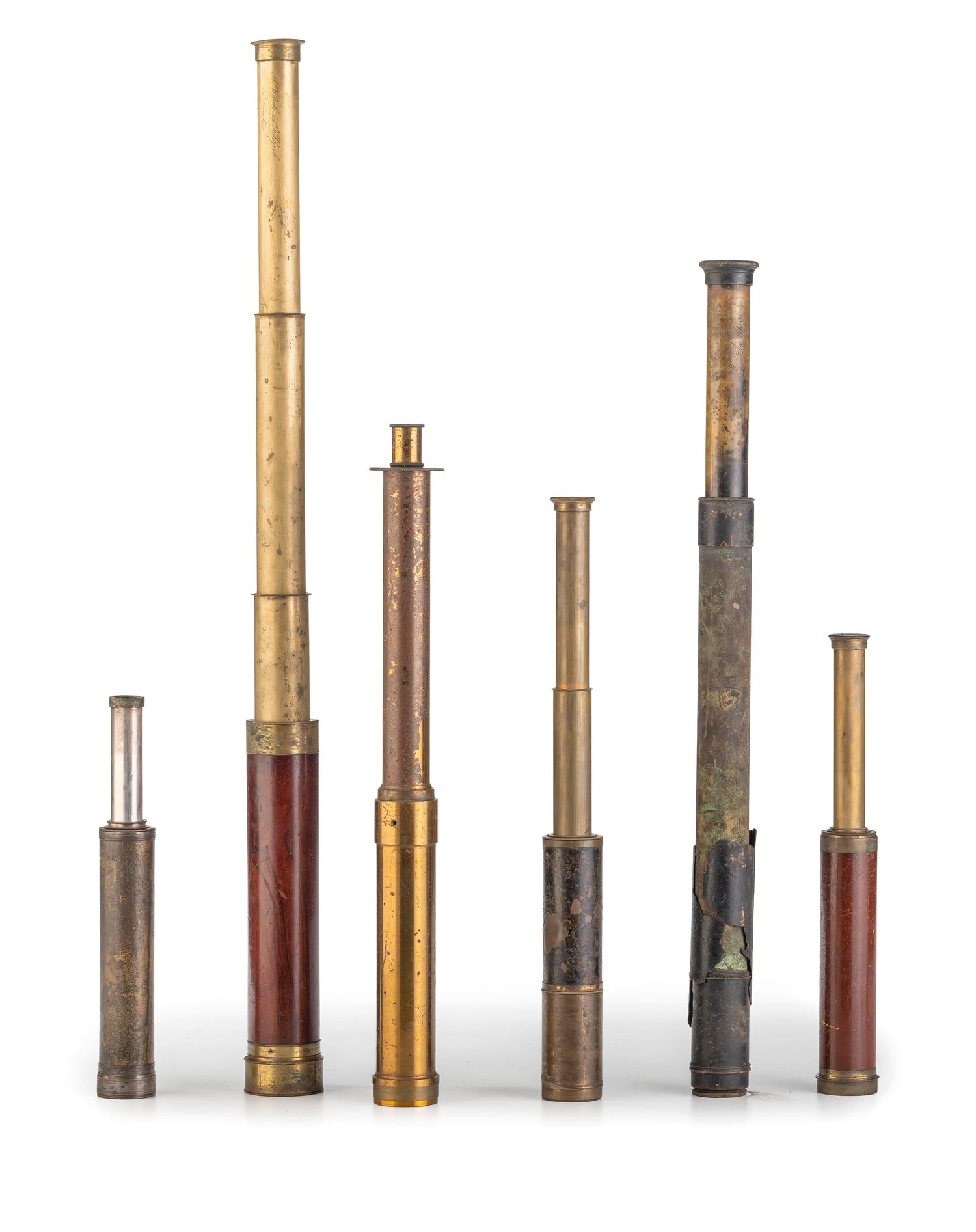A group of 6 handheld telescopes found in the workshop of George W. Fitz, Peconic, New York.