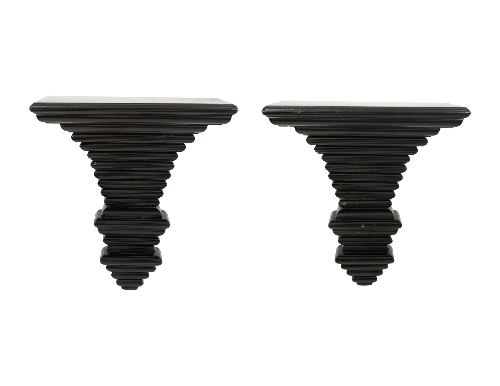 A Pair of Ebonized Wall Brackets