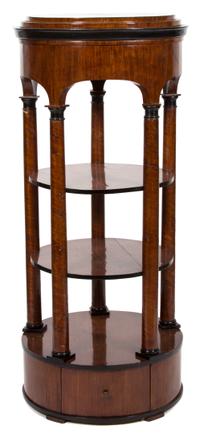 A Biedermeier Mahogany and Partially Ebonized Circular Three-Tier Etagere Height 59 x diameter 26 inches. — 19TH CENTURY