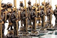 A Giuseppe Vasari Gilt and Silvered Bronze Medieval Chess Set