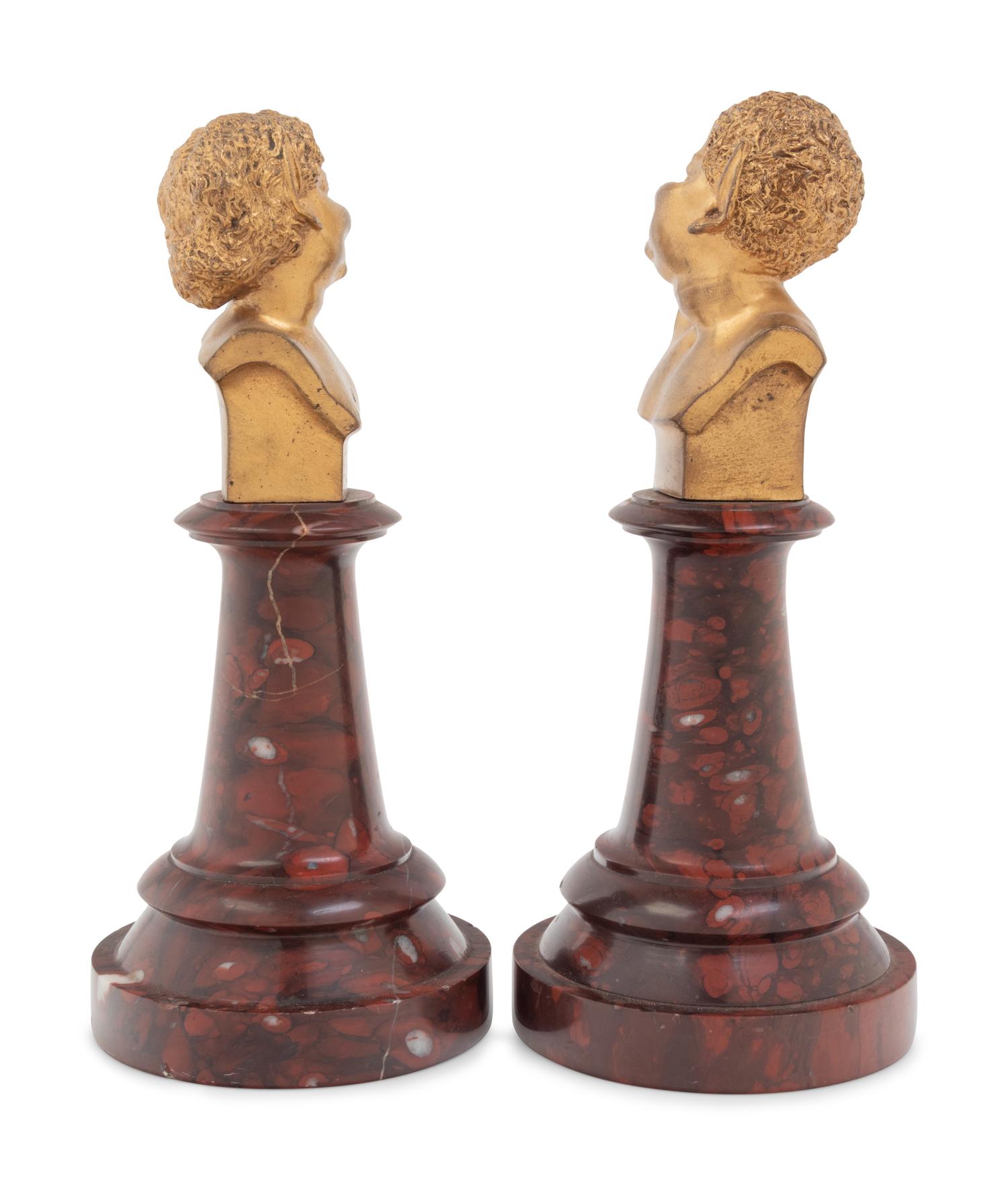 A Pair of French Gilt Bronze and Marble Busts