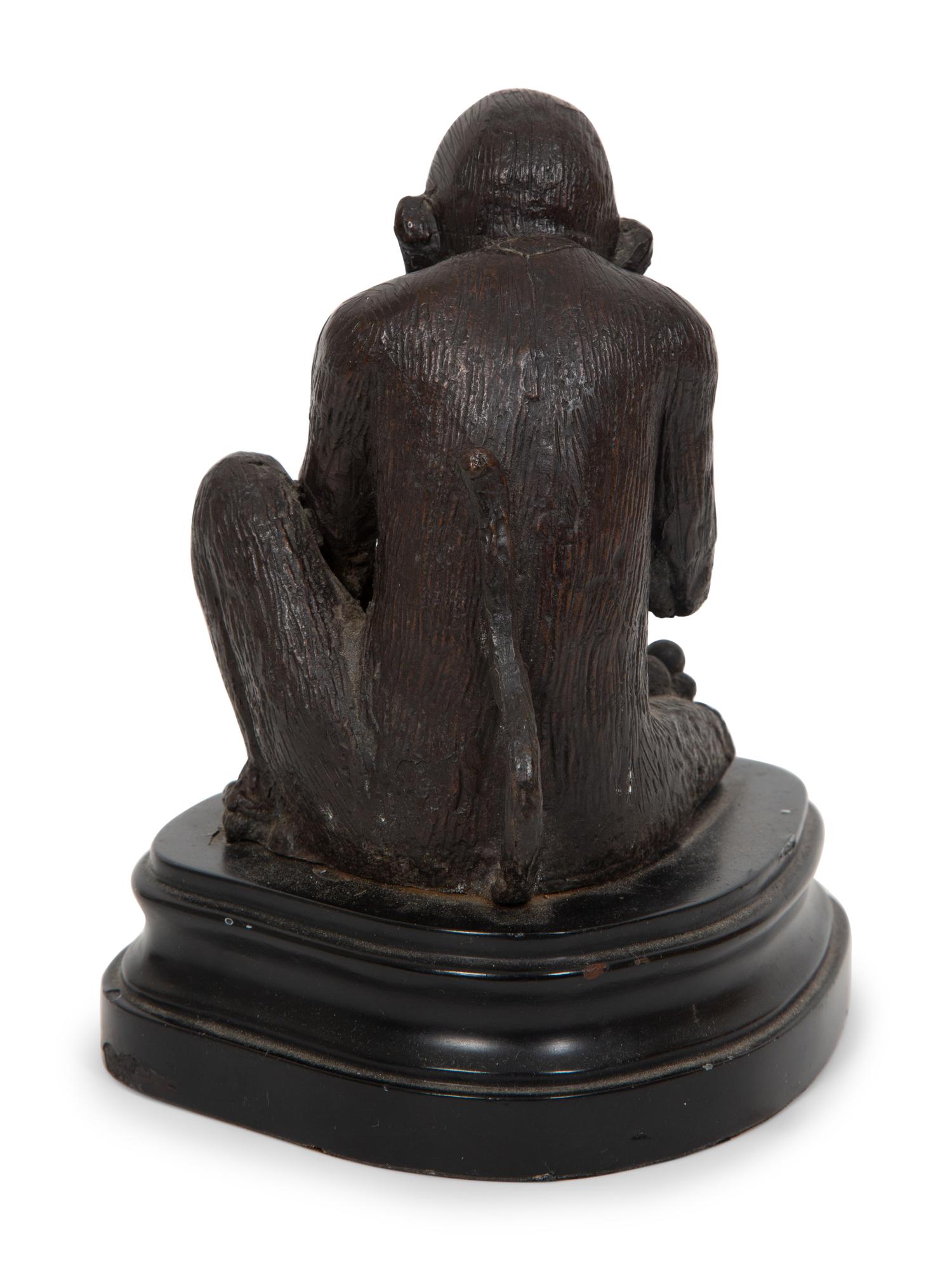 A Continental Bronze Sculpture of a Seated Monkey