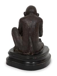 A Continental Bronze Sculpture of a Seated Monkey