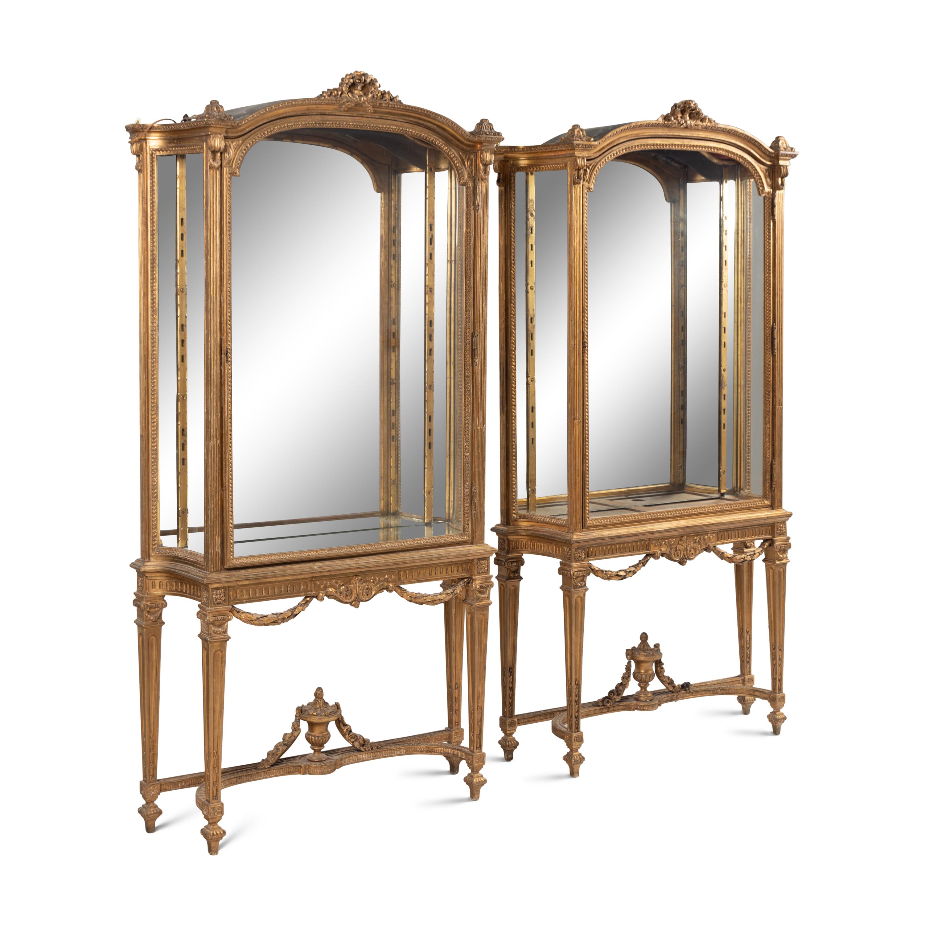 A Pair of Louis XVI Style Giltwood Vitrine Cabinets