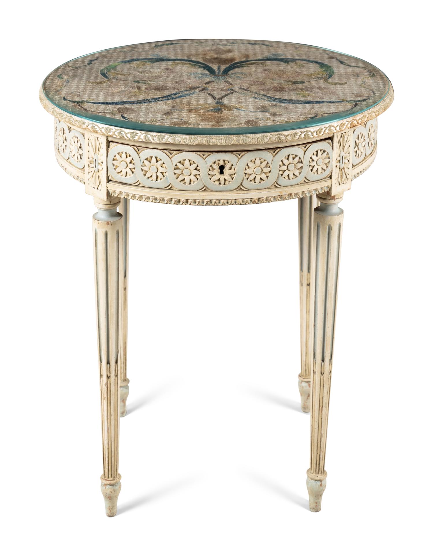 A French Table with an Embroidered Top