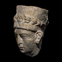 A Palmyrene Limestone Head of a Priest