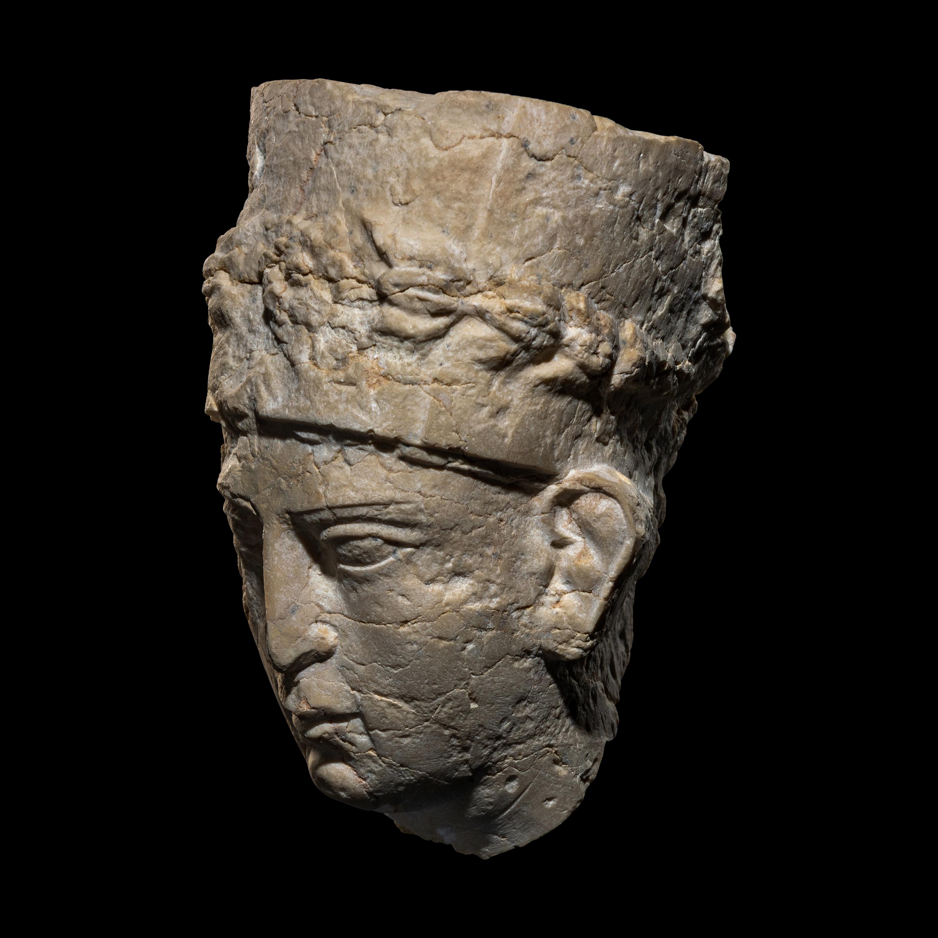 A Palmyrene Limestone Head of a Priest