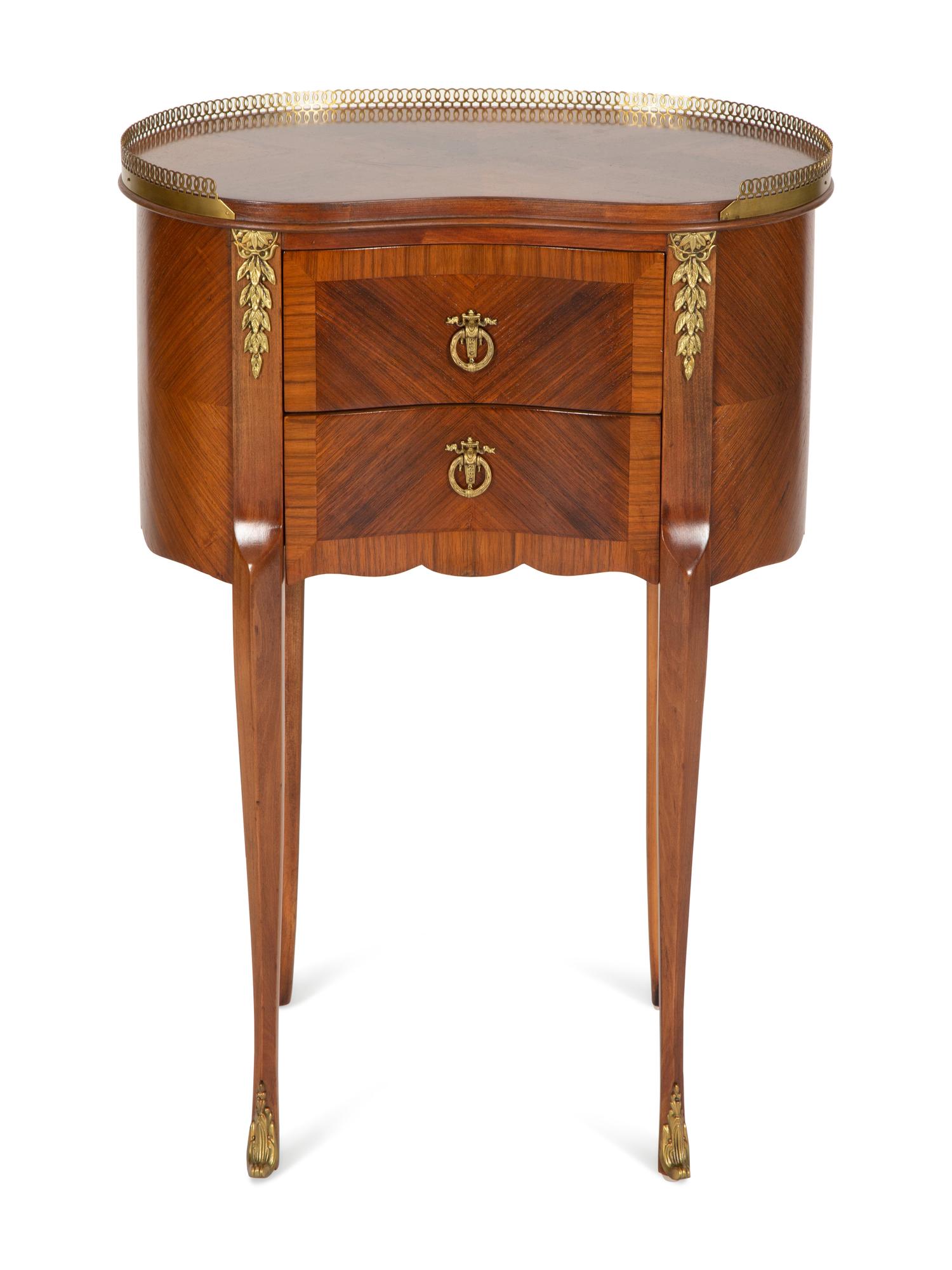 A Louis XV Style Gilt Bronze Mounted Parquetry Chiffonnier