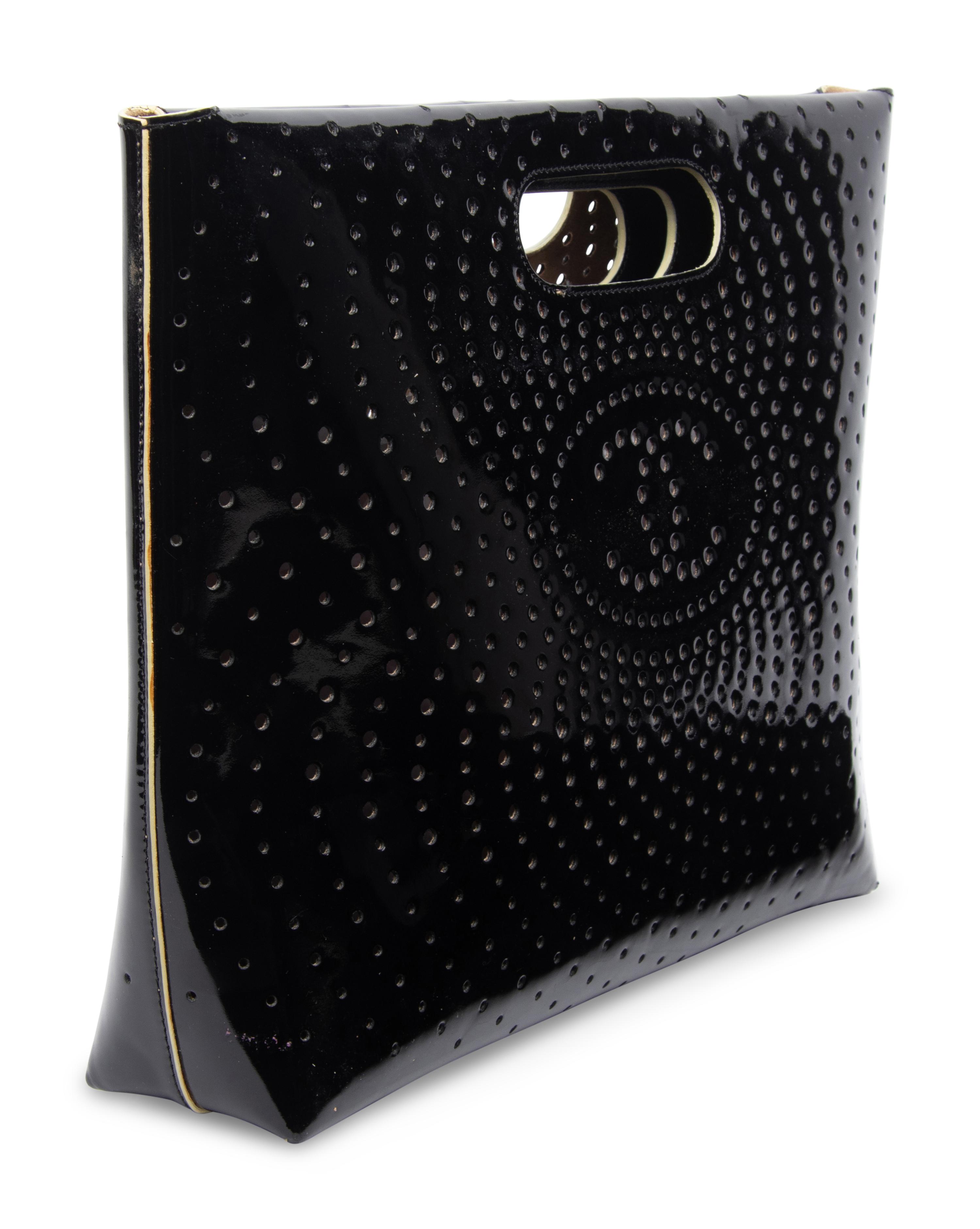 CHANEL, PERFORATED PATENT LEATHER HANDBAG