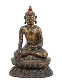 A Large Nepalese Gilt Bronze Figure of Seated Buddha