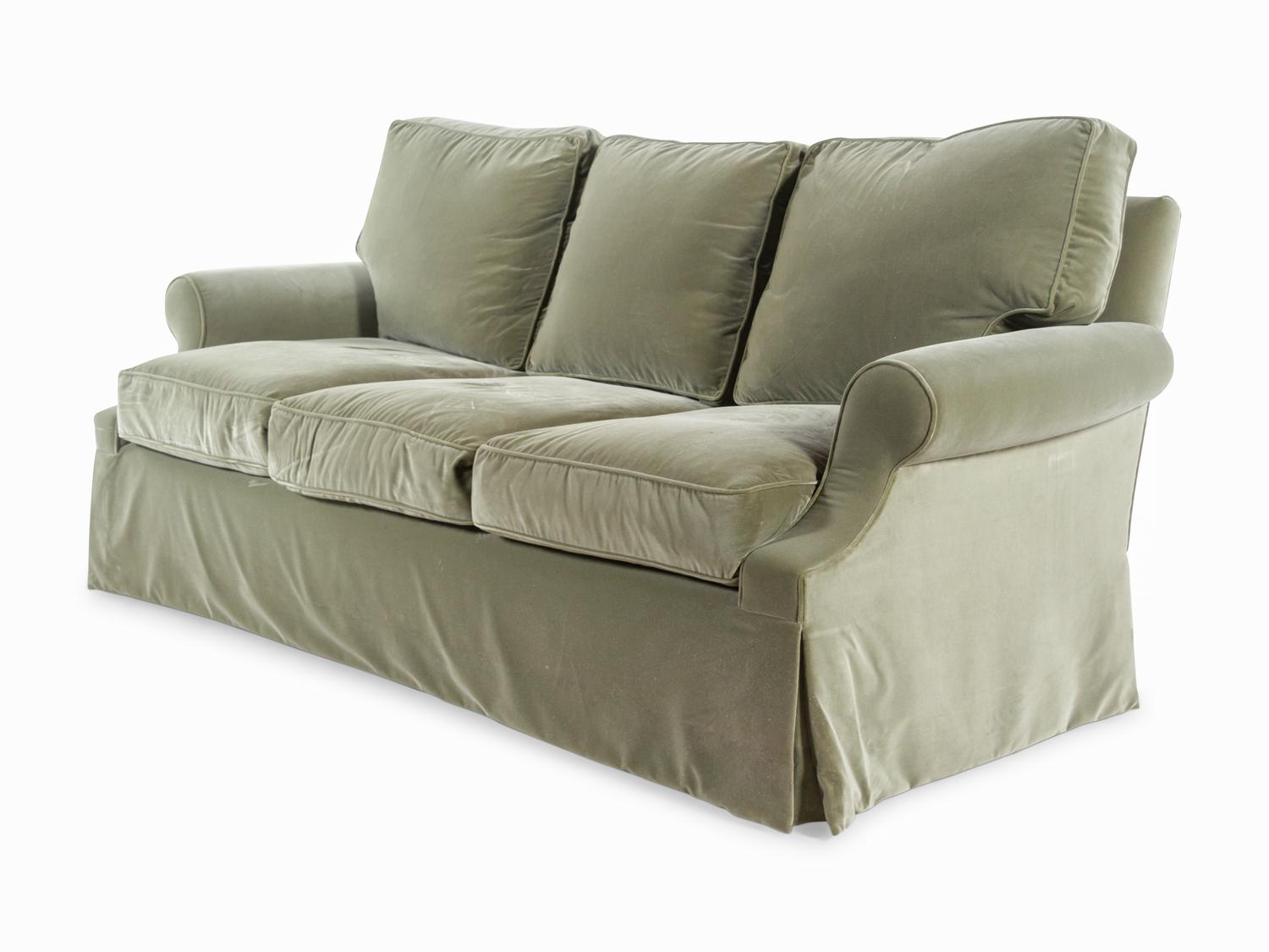 A Green Velvet Upholstered Three-Seat Sofa