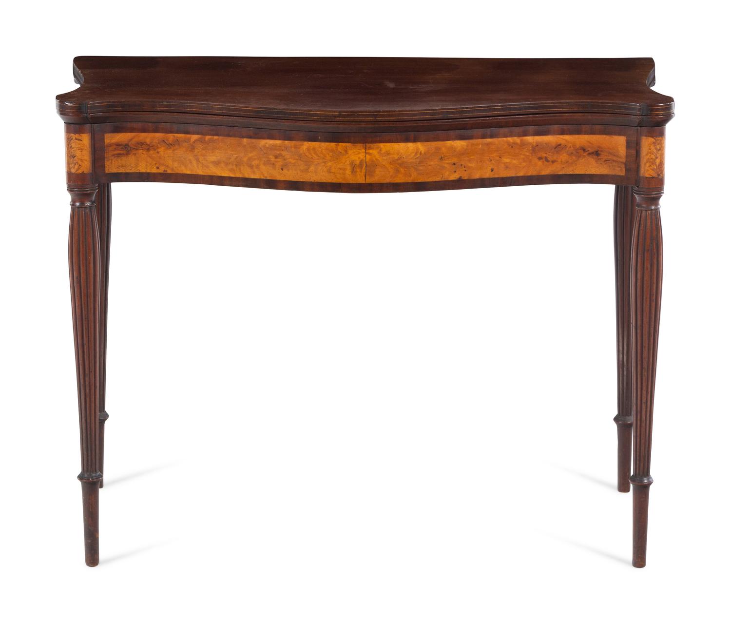 A Federal Birch and Mahogany Serpentine-Top Game Table