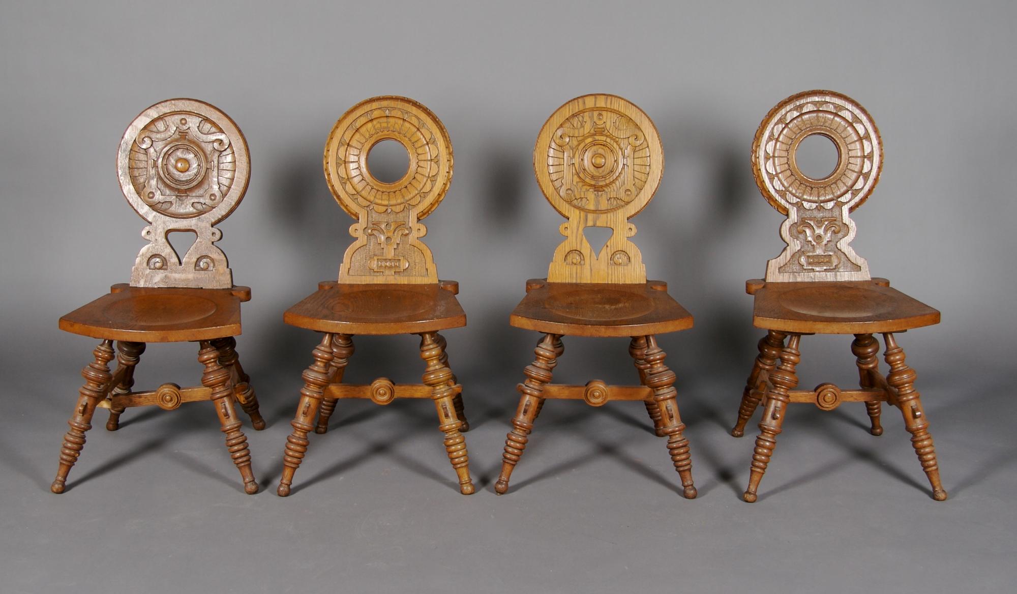 A Set of Four Oak Hall Chairs, Height 34 1/2 inches.
