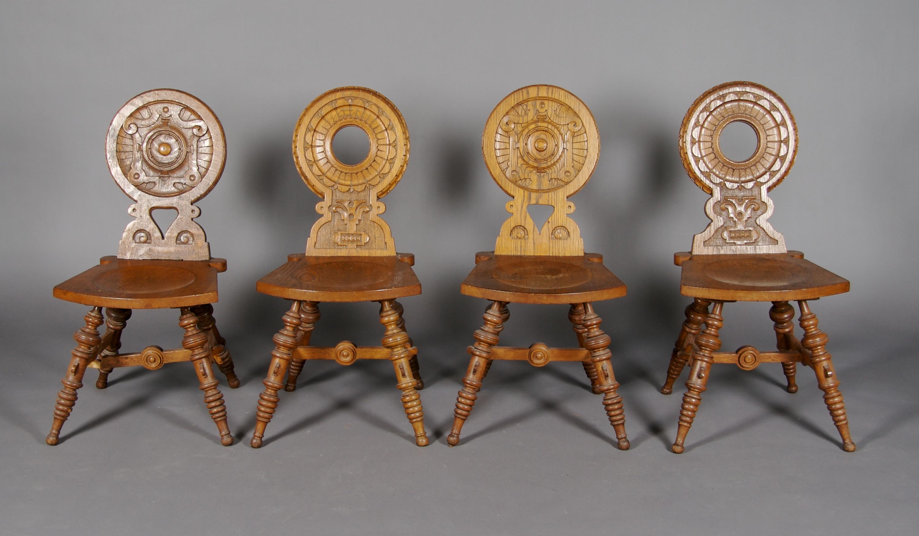 A Set of Four Oak Hall Chairs, Height 34 1/2 inches.