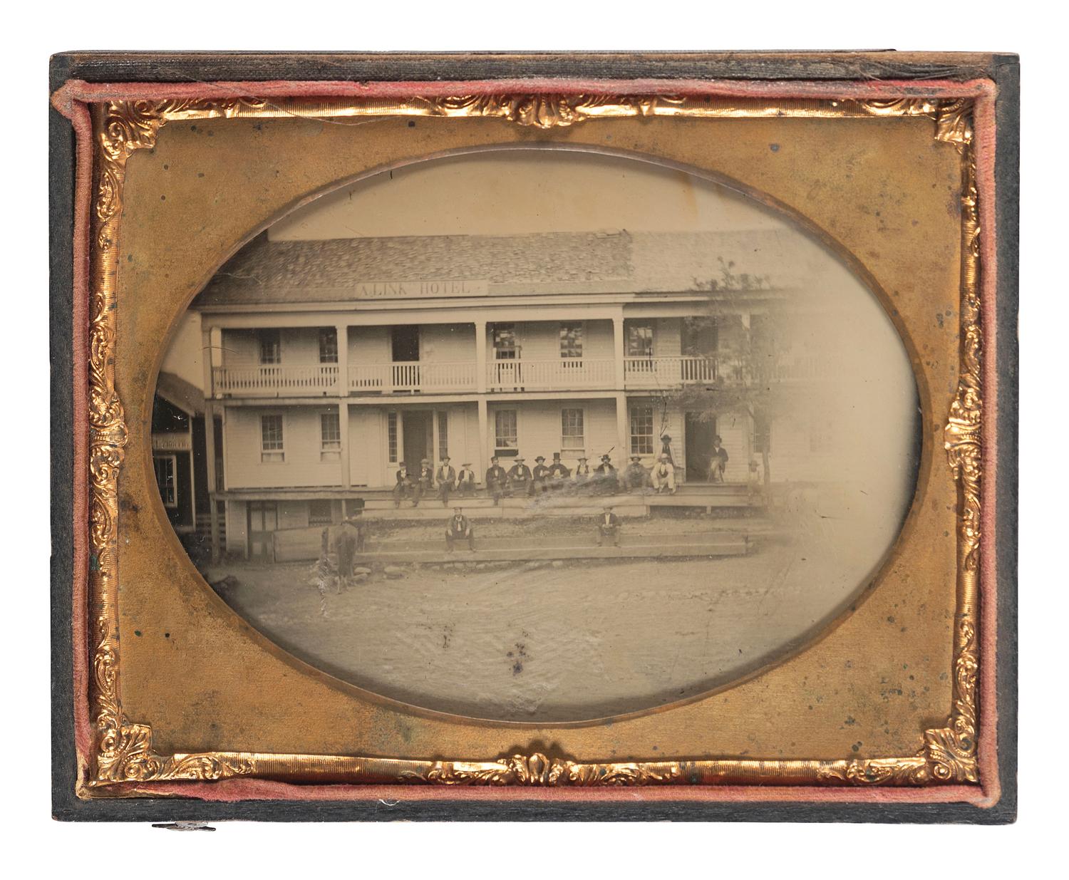 [EARLY PHOTOGRAPHY]. Half plate ambrotype featuring the A. Link Hotel, Coddingville, Medina County, Ohio.