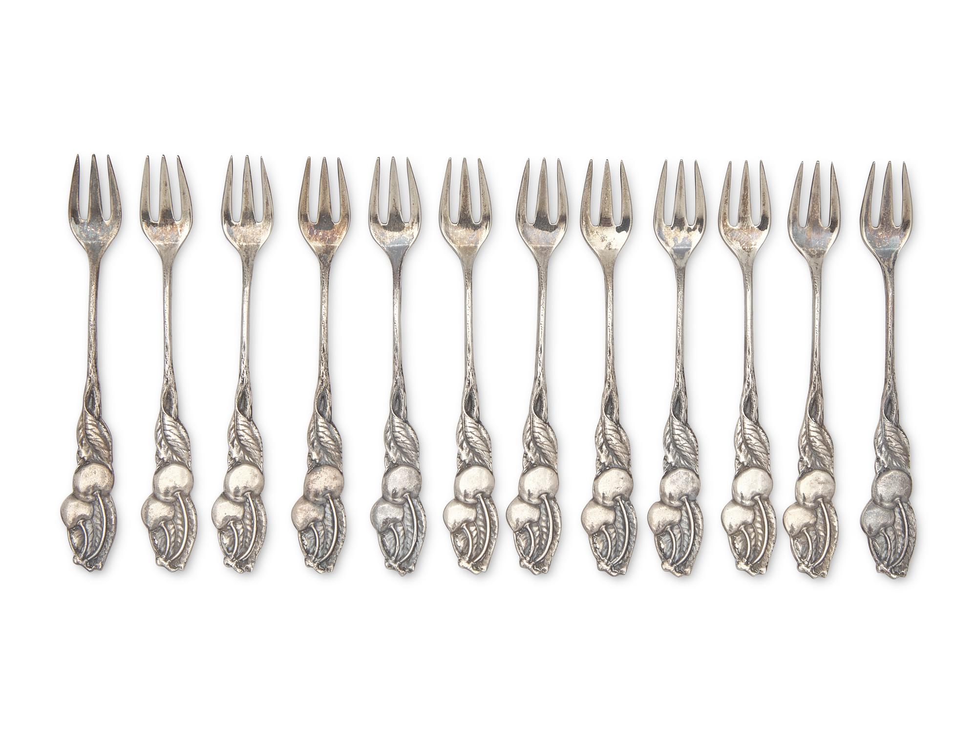 A Cased Set of Twelve Sterling Silver Cocktail Forks in the "Cherry" Pattern, Tiffany & Co., New York, NY, Late 19th / Early 20th Century