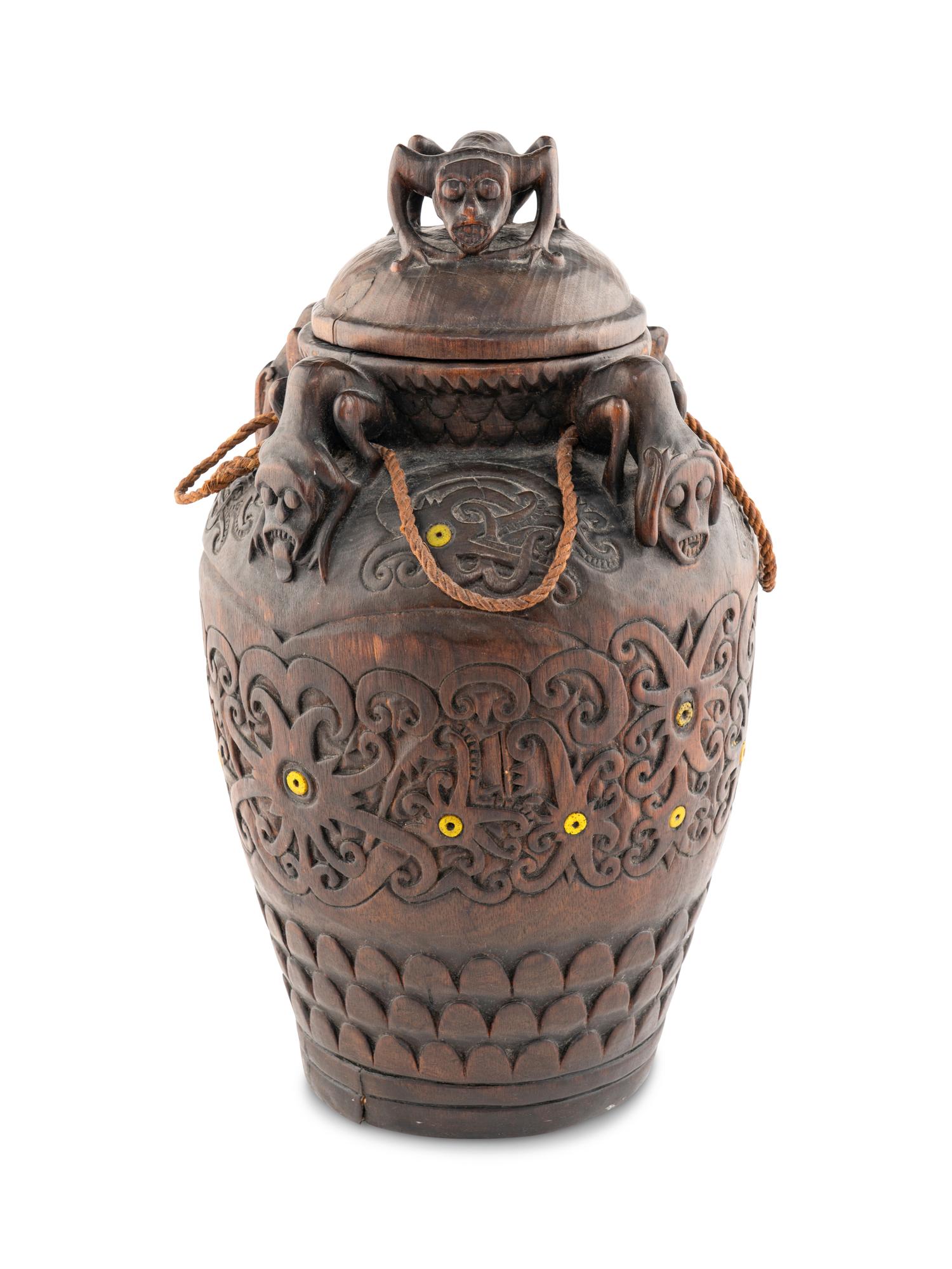 An Oceanic Carved Wood Lidded Vessel