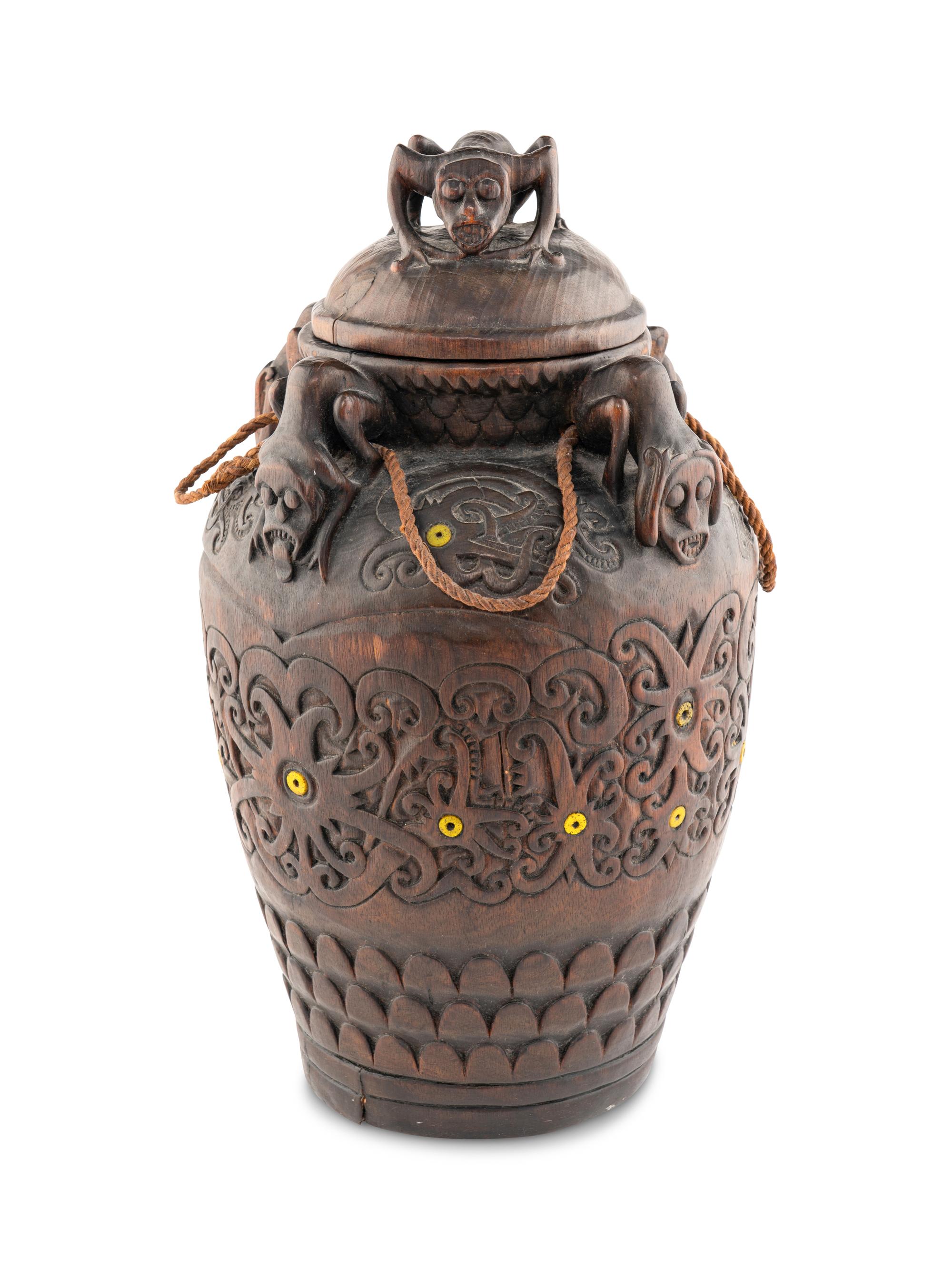 An Oceanic Carved Wood Lidded Vessel