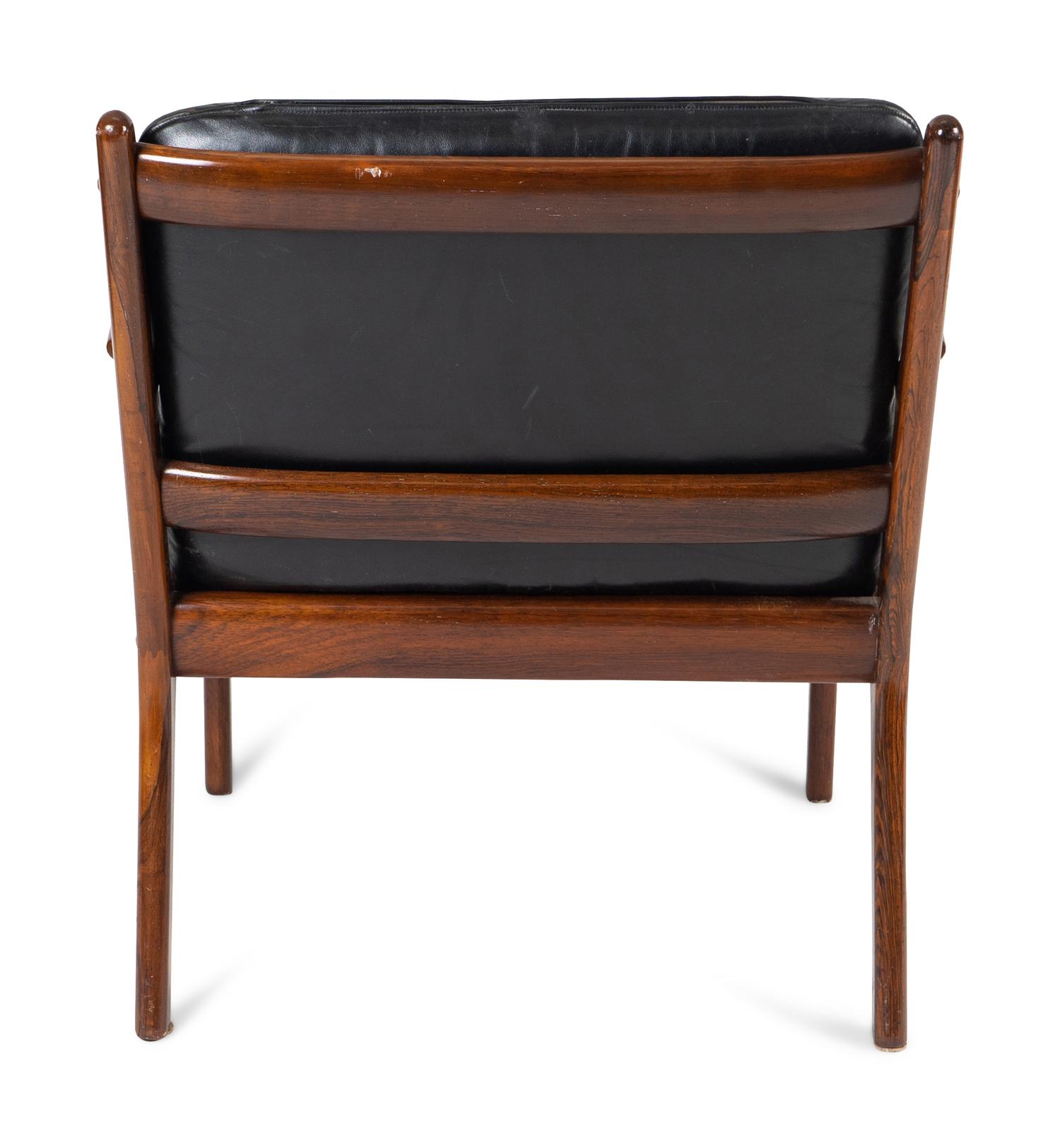 An Ole Wanscher Palasander Armchair — DANISH, 1903-1985