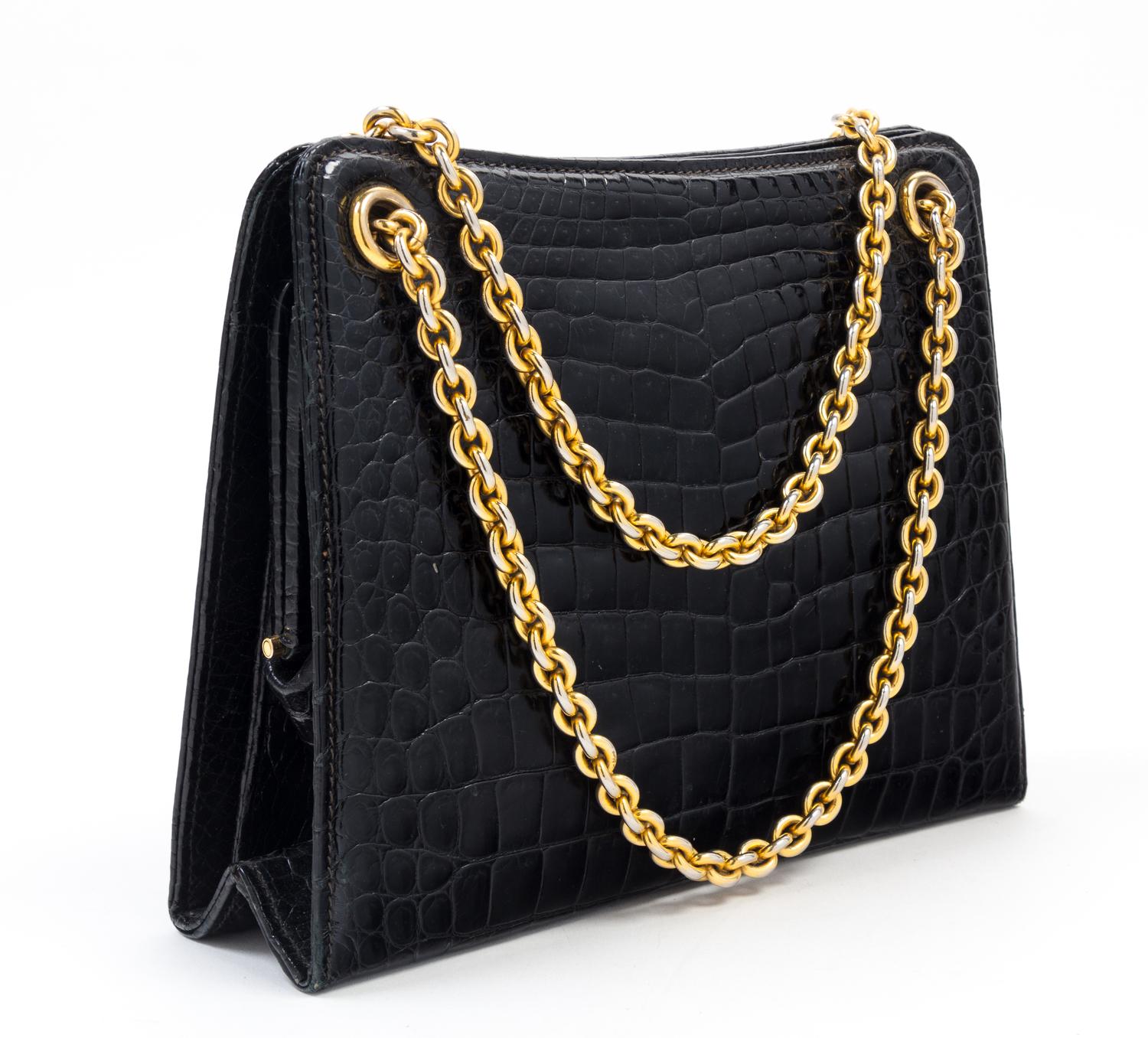 A Gucci Black Crocodile Handbag, 9.5" x 7.5" x 2.5"; Strap drop: 5.5".