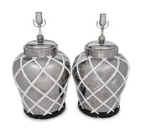 A Pair of Silvered and White Glazed Table Lamps