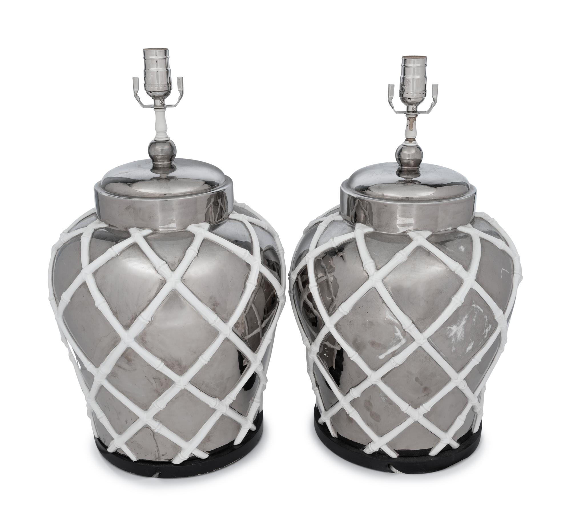 A Pair of Silvered and White Glazed Table Lamps