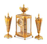 An English Champlevé Enamel and Gilt Bronze Clock Garniture