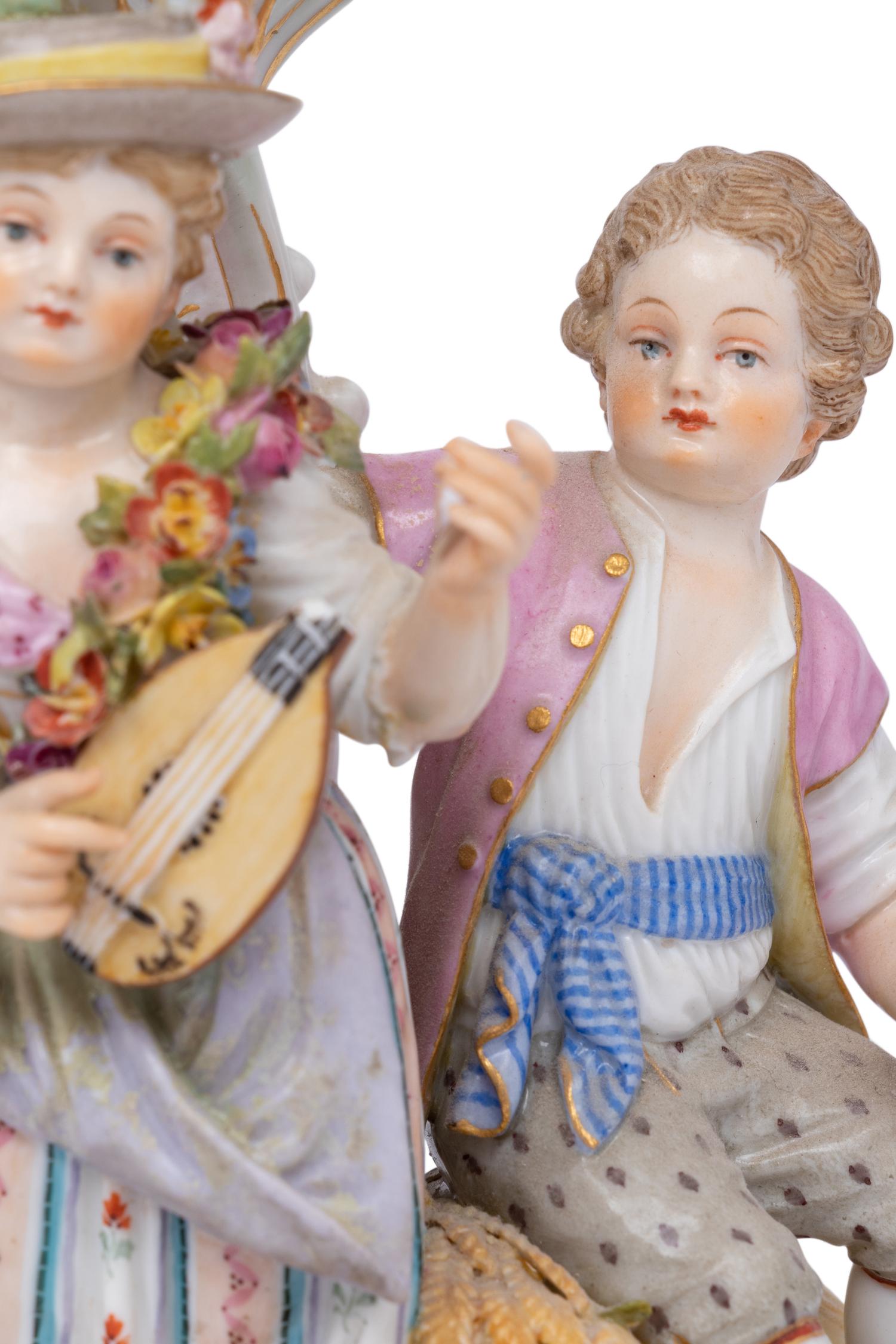 A Pair of Meissen Porcelain Candelabra