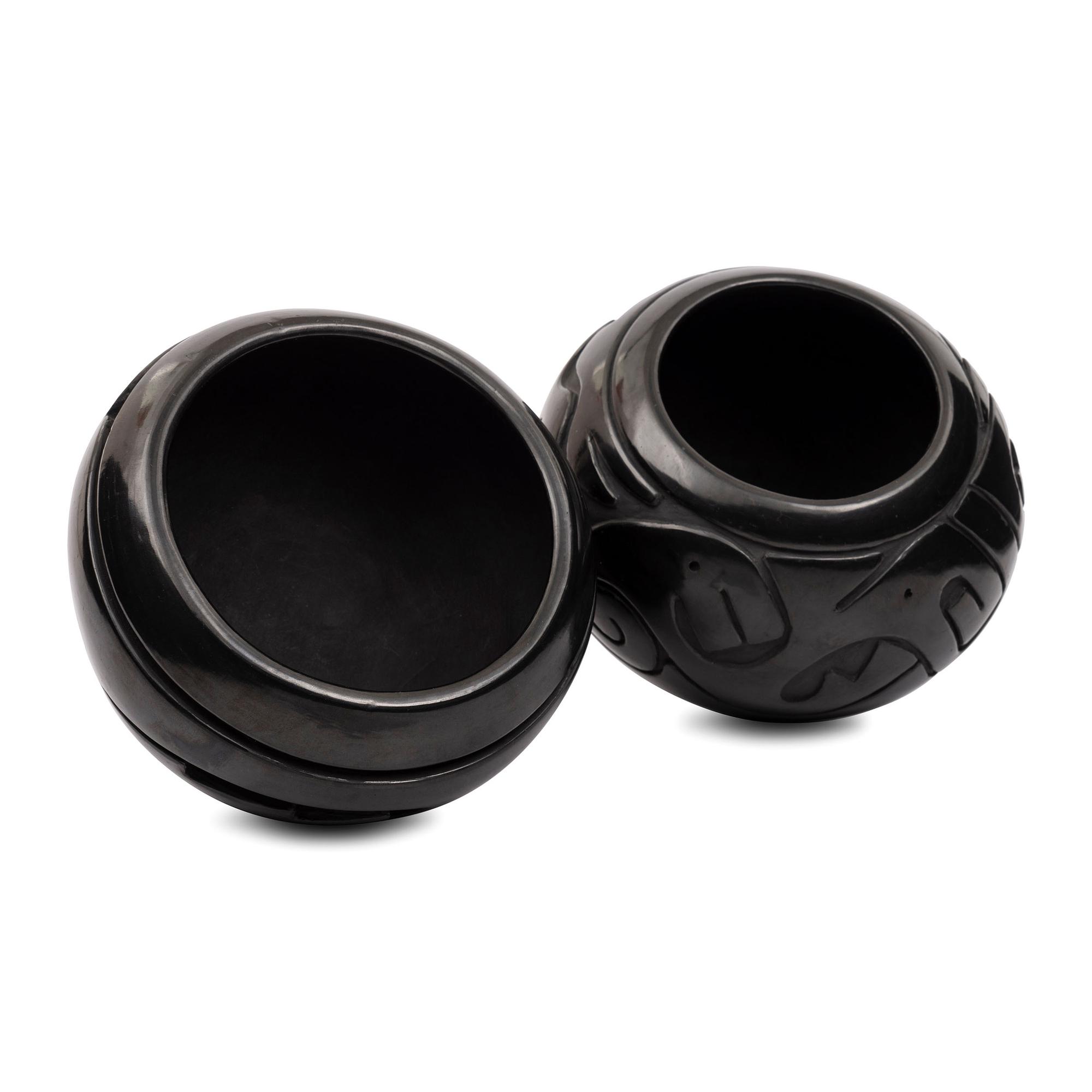 Carved Blackware Jars, one with Avanyu