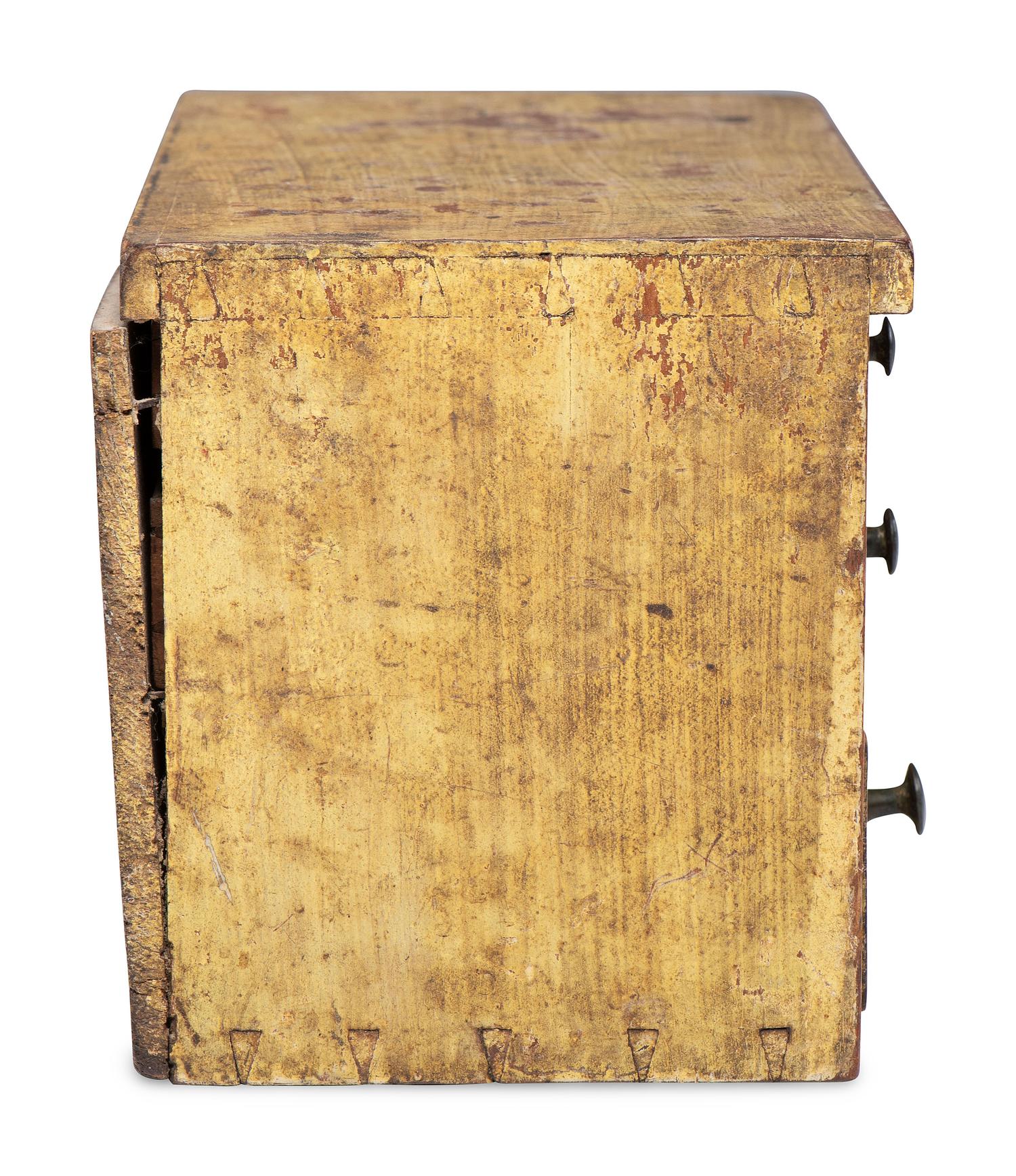 A Southern Yellow Painted Cherrywood and Yellow Pine Miniature Chest