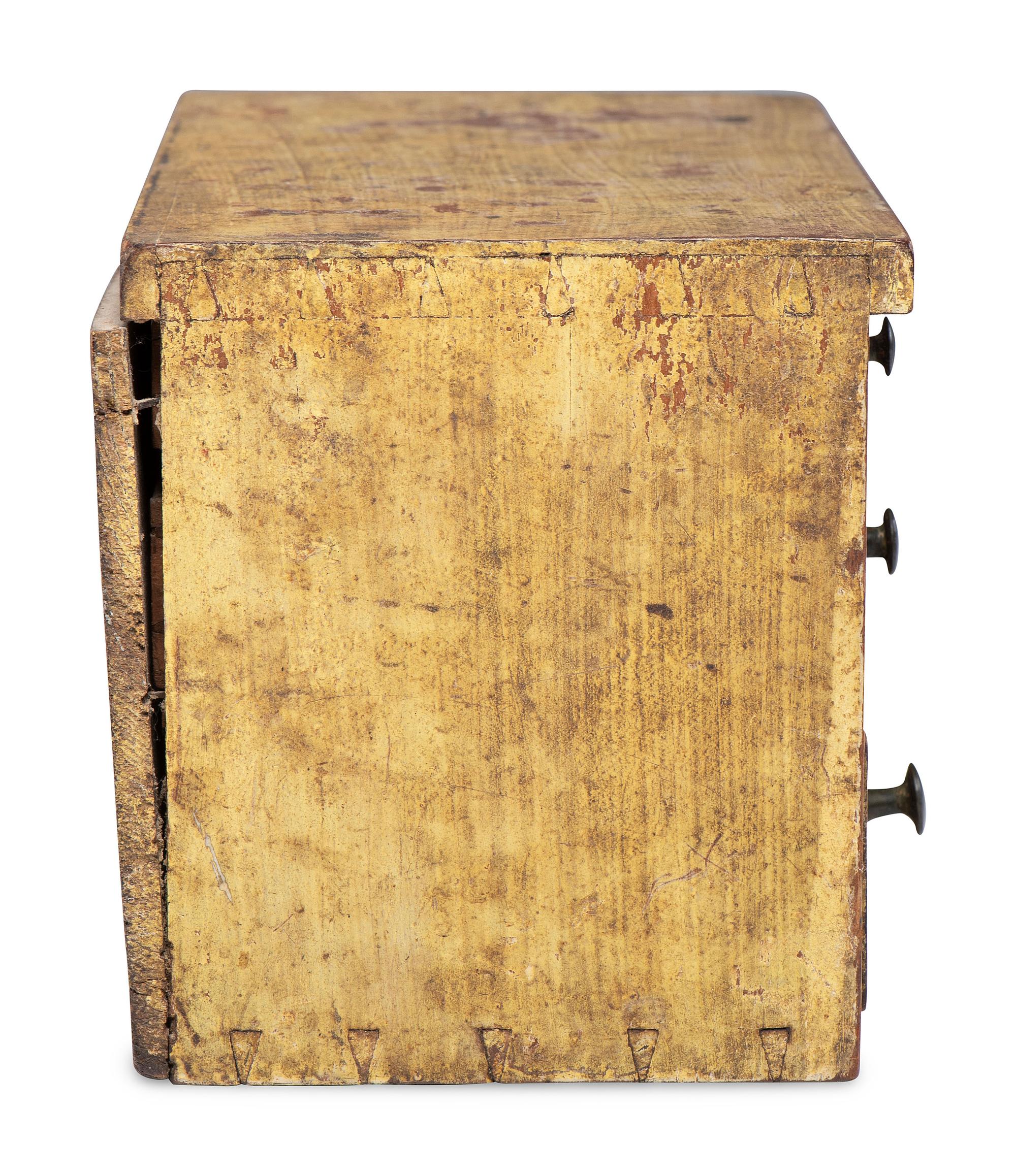A Southern Yellow Painted Cherrywood and Yellow Pine Miniature Chest