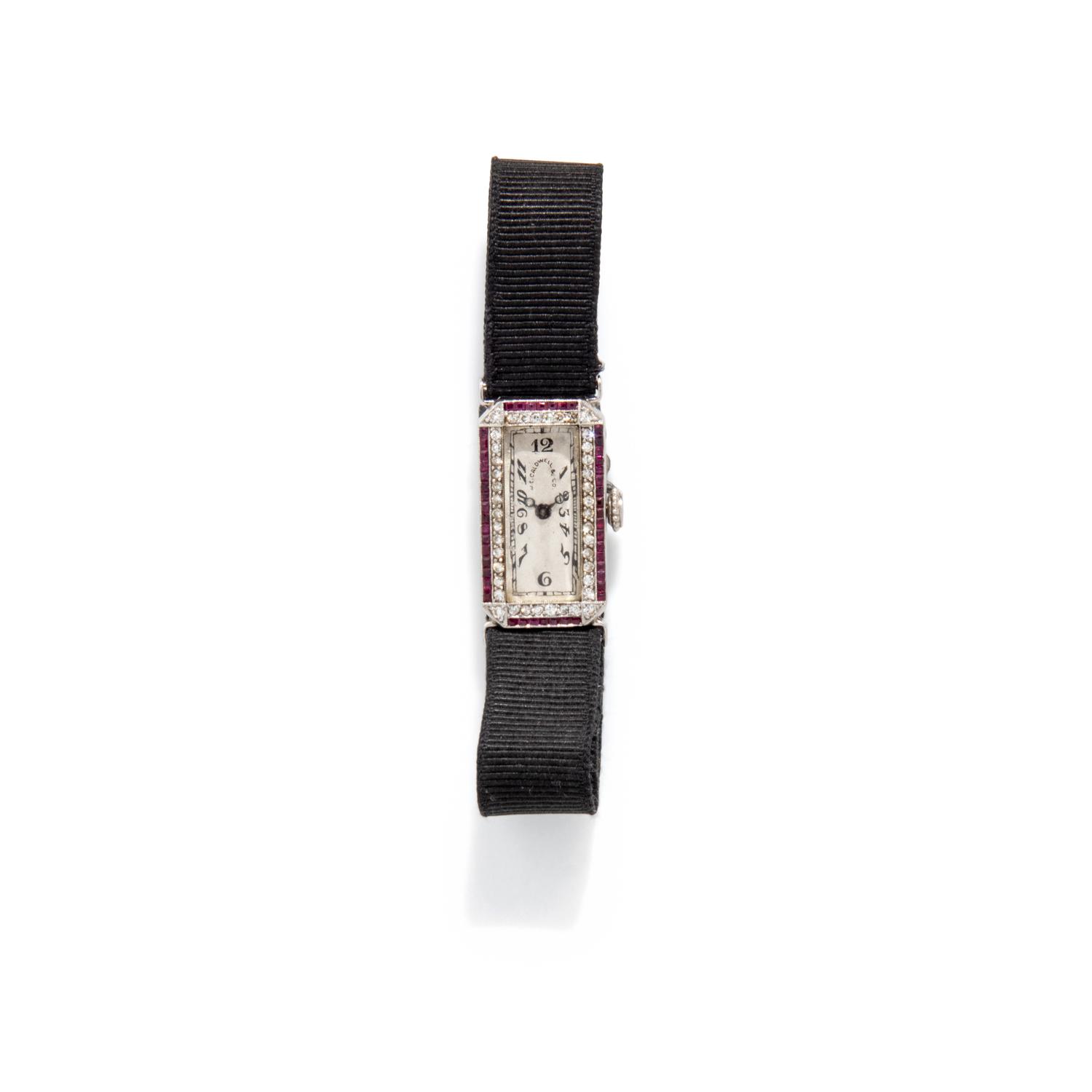J.E. CALDWELL, PLATINUM, RUBY, AND DIAMOND WATCH