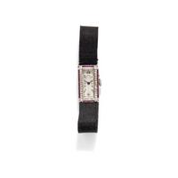 J.E. CALDWELL, PLATINUM, RUBY, AND DIAMOND WATCH