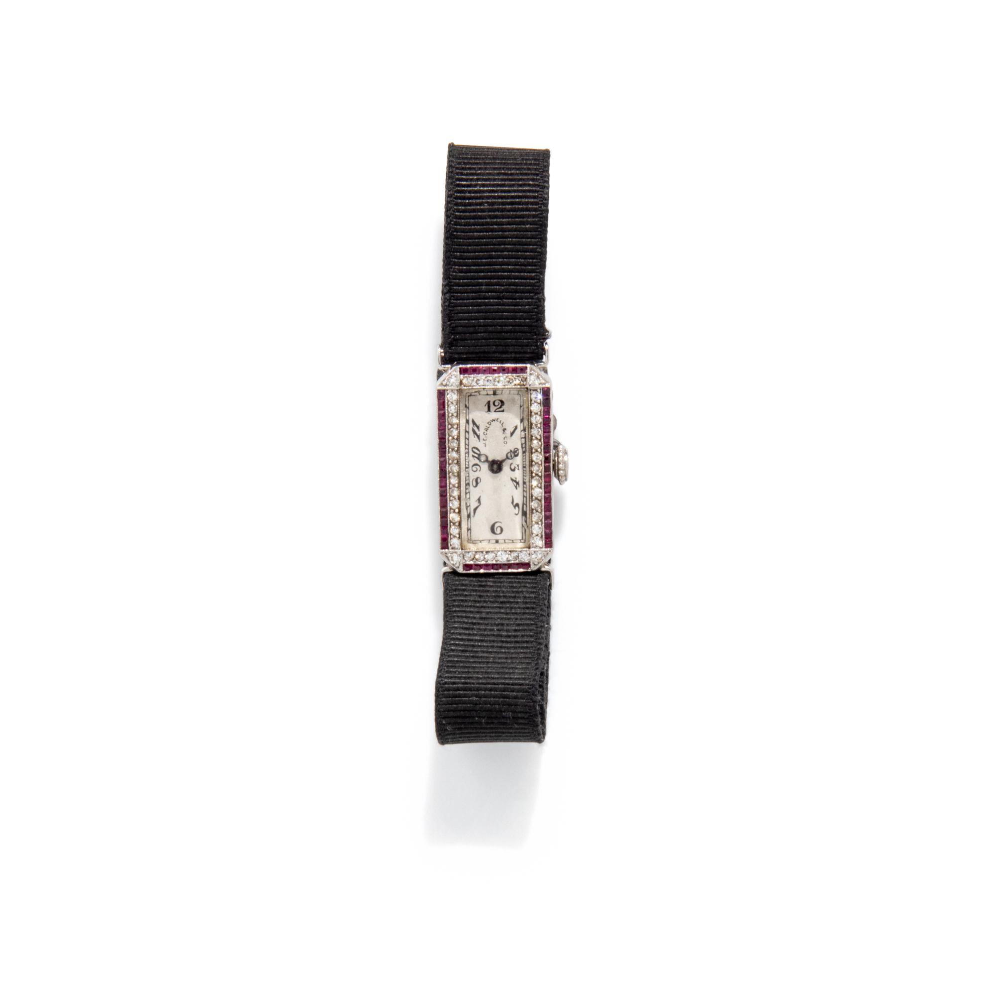 J.E. CALDWELL, PLATINUM, RUBY, AND DIAMOND WATCH