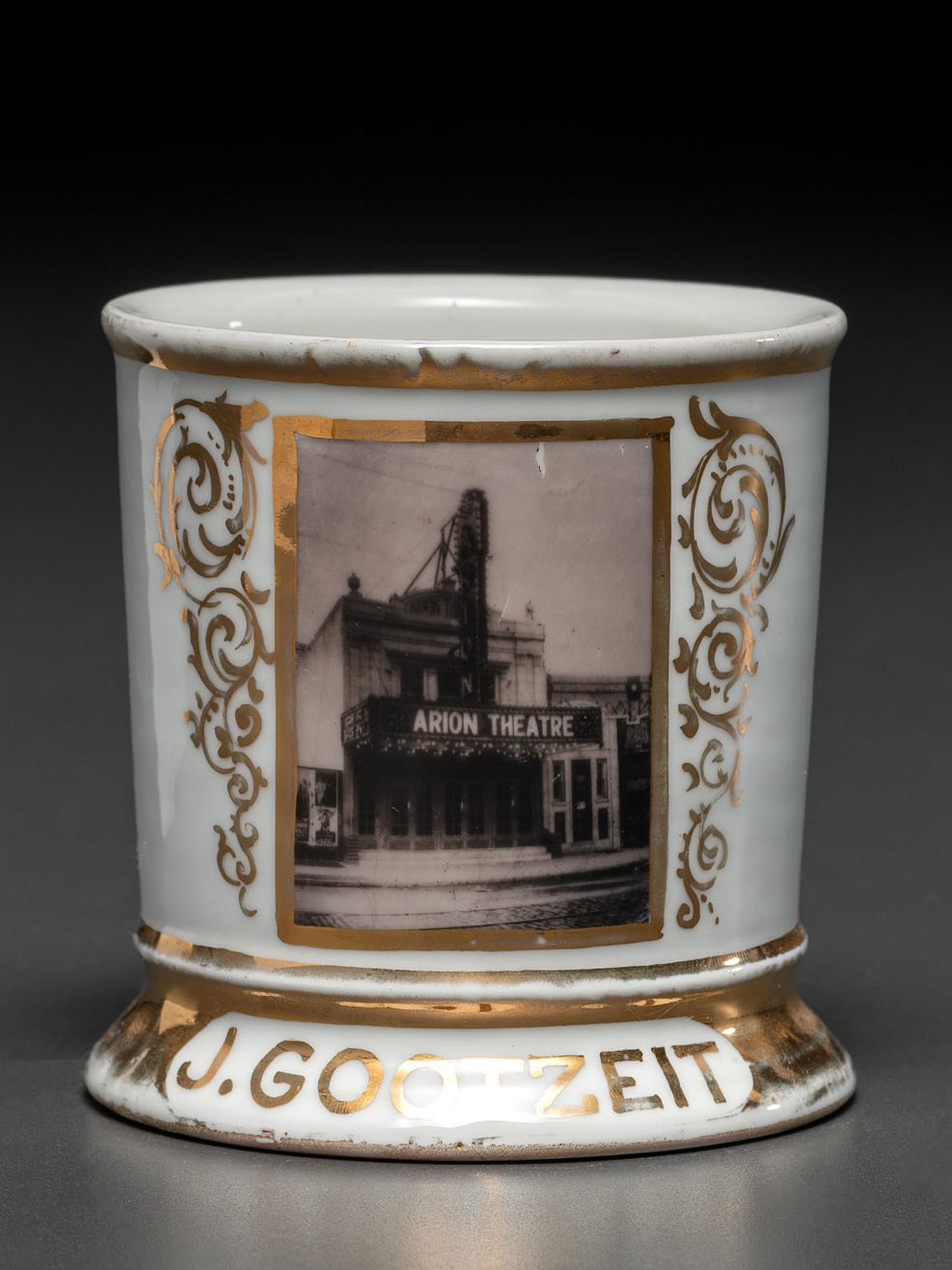 A Photographic Transfer Porcelain Shaving Mug Depicting the Arion Theatre, New York