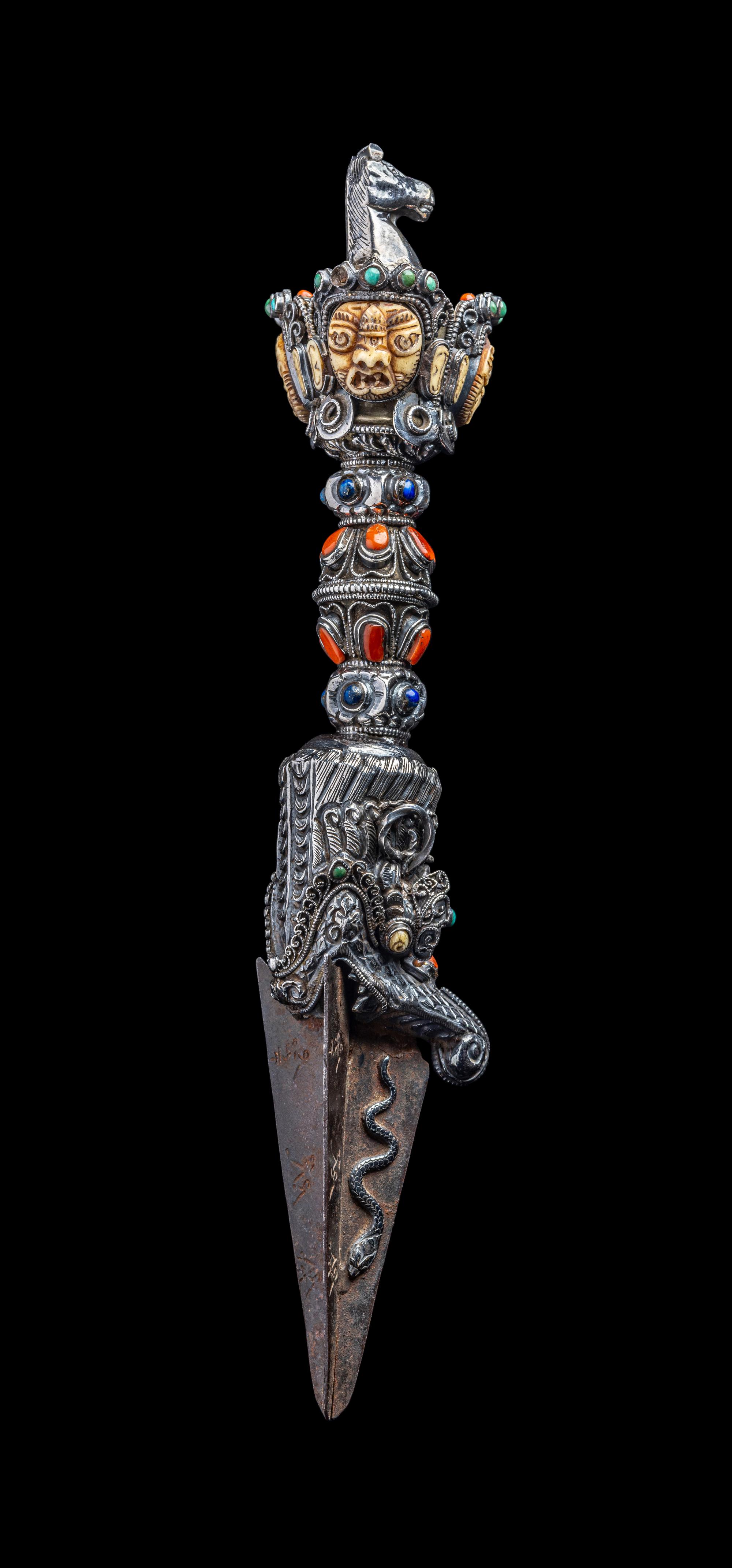 A Tibetan Hardstone Inset Silver Vajra