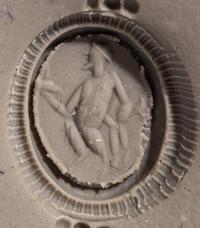A Roman Gold and Jasper Finger Ring with a Dancing Satyr