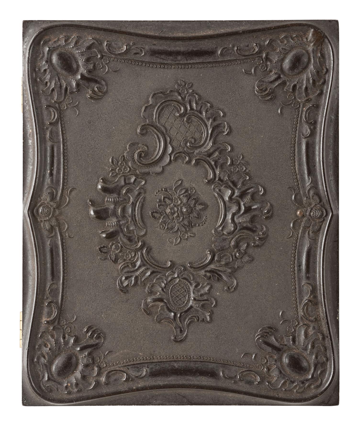[EARLY PHOTOGRAPHY]. 3 daguerreotypes featuring folk art portraits of male and female subjects.