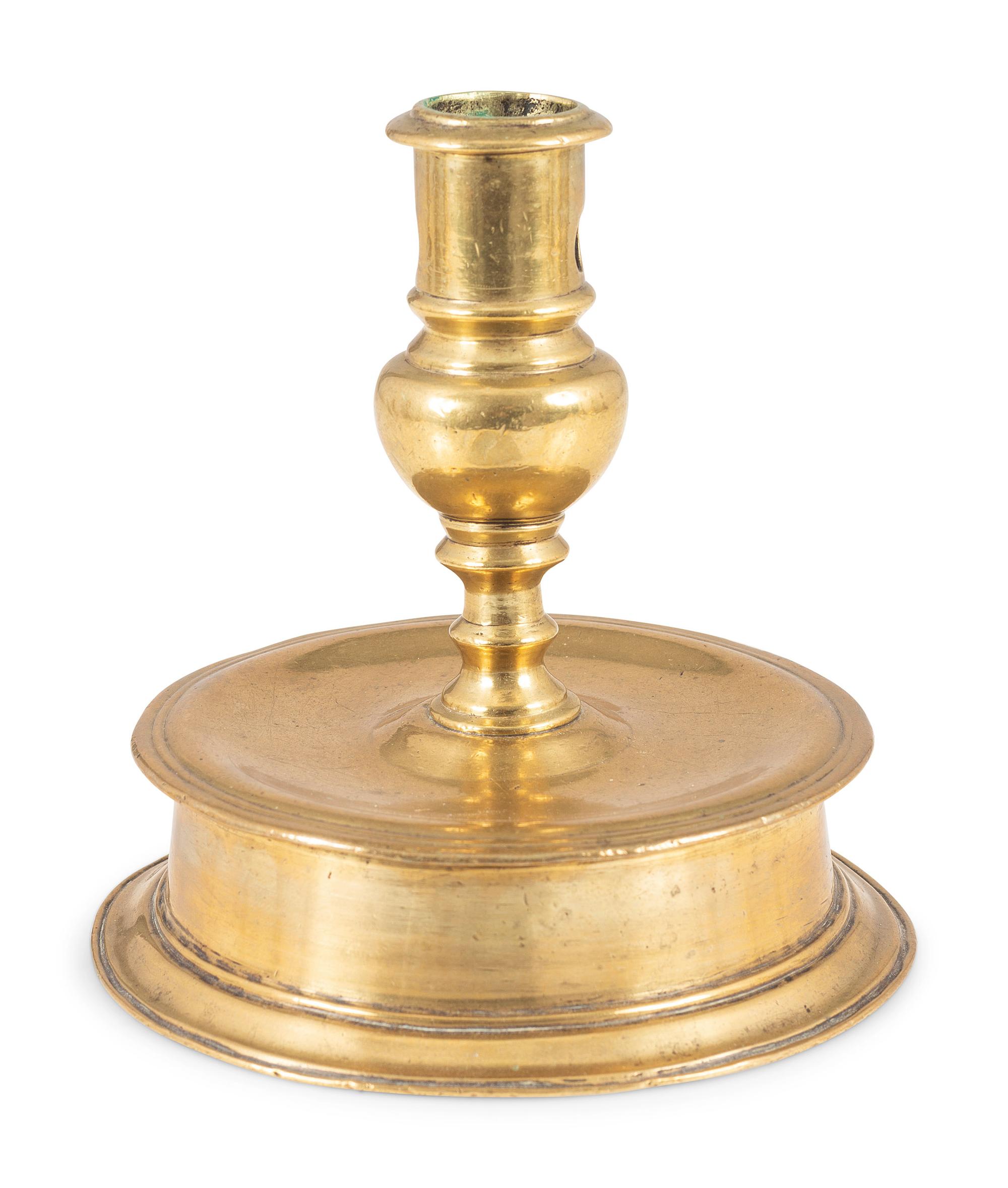 A Continental Cast Brass Capstan Candlestick