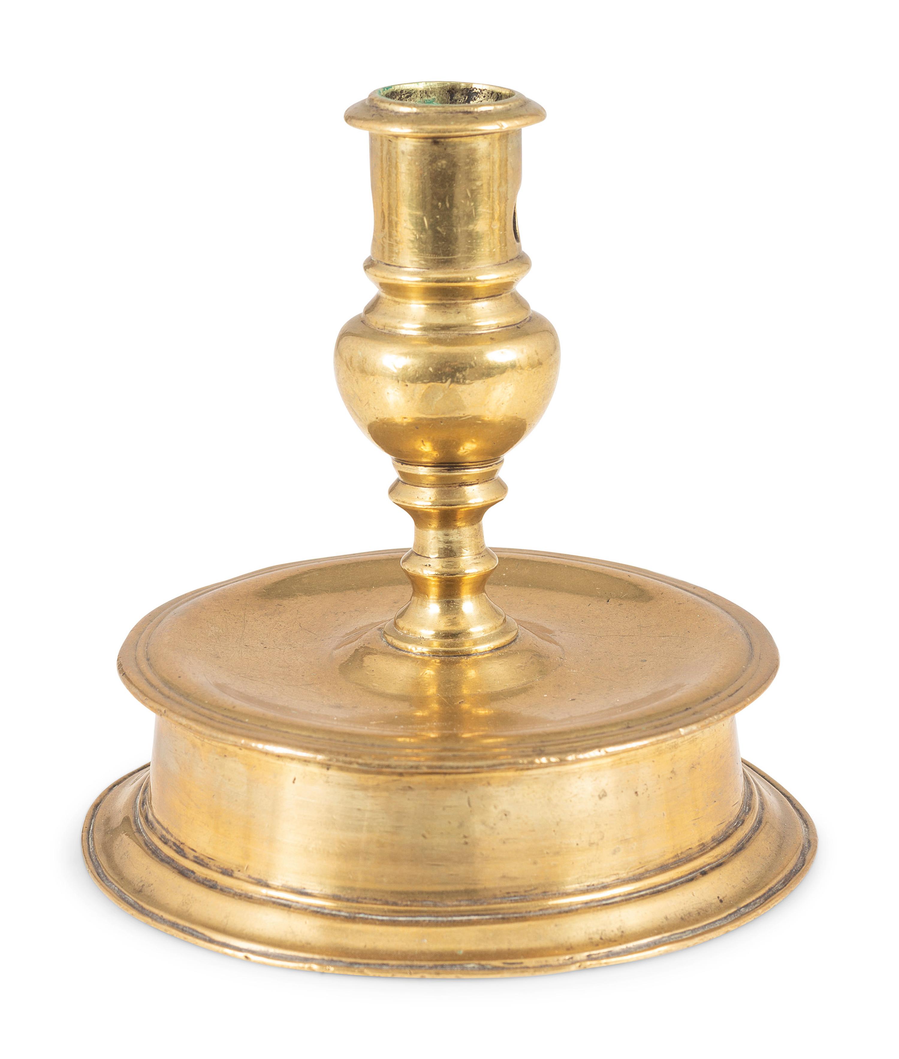 A Continental Cast Brass Capstan Candlestick